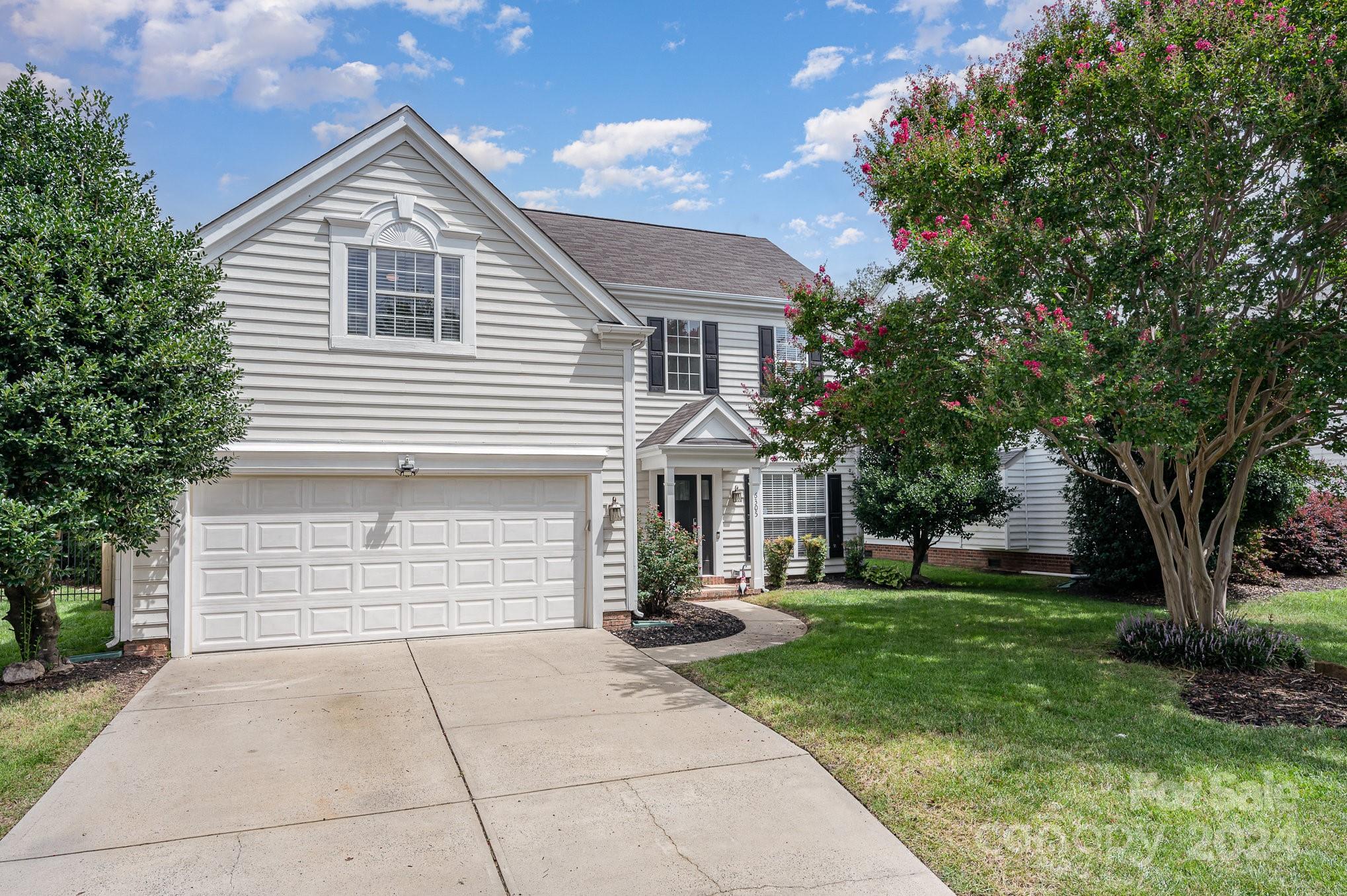Welcome home to this meticulously cared for two-story, complete with a private fenced yard, and a welcoming, bright and open floorplan. You will love the cute kitchen/breakfast area, enhanced by a clever coffee bar and beverage cooler that will remain. The kitchen appliance package is updated and the fridge remains also. And there is a functional drop zone feature right near the front foyer. Upstairs, there are 3 bedrooms and a spacious bonus room. The Owner's Suite includes a fabulous and grand tile shower in the on-suite bath. Outside, privacy abounds with mature landscaping and a fabulous deck for grilling & entertaining. One of the neighborhhood walking trails is conveniently located right behind the fenced area of the rear yard. Other amenities are nearly boundless and include several pools and a neighborhood golf course, among the areas finest. Newer HVAC (12/2021) and the tankless hot water is a recent upgrade (5/2023). There are abundant nearby shopping choices as well!