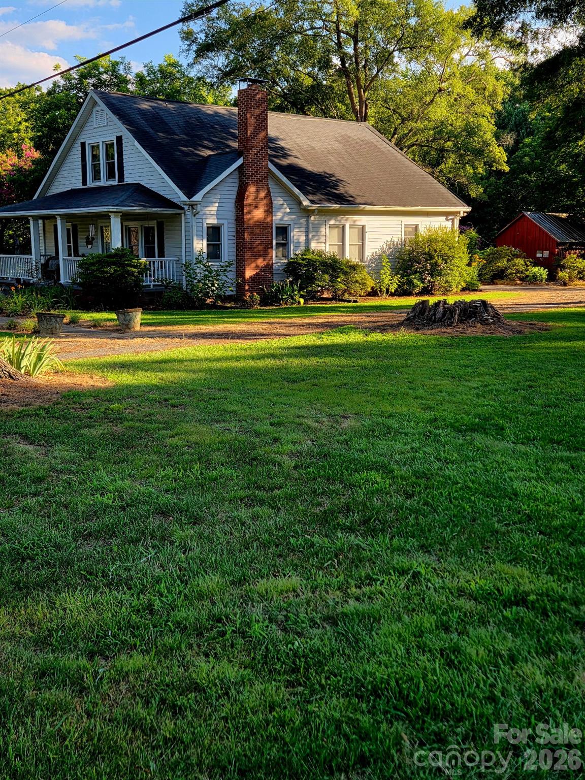 Paradise awaits, everything you need and want in the city limits.  Great built home with 2 covered porches.  Almost 3 acres, with additional sheds and a nice shop building on this estate.  Hardwoods in home with farm house feel, comfy and cozy with fireplace and good living.  Enough room to have cows, huge garden area already fenced in.  Newer windows and AC, nice home with lots of room to grow the family.  Homestead and grow your own garden, could also be a nice wedding venue event space, come check it out, possibilities unlimited.  2 Driveway entrances that circle around the property. Newer water heater and large appliances, come check out this dream. 

Live in the city but also have all the things of simple homestead, huge grape vines on property also and numerous fruit trees. 

Call LA for showing, must accompany showing.
