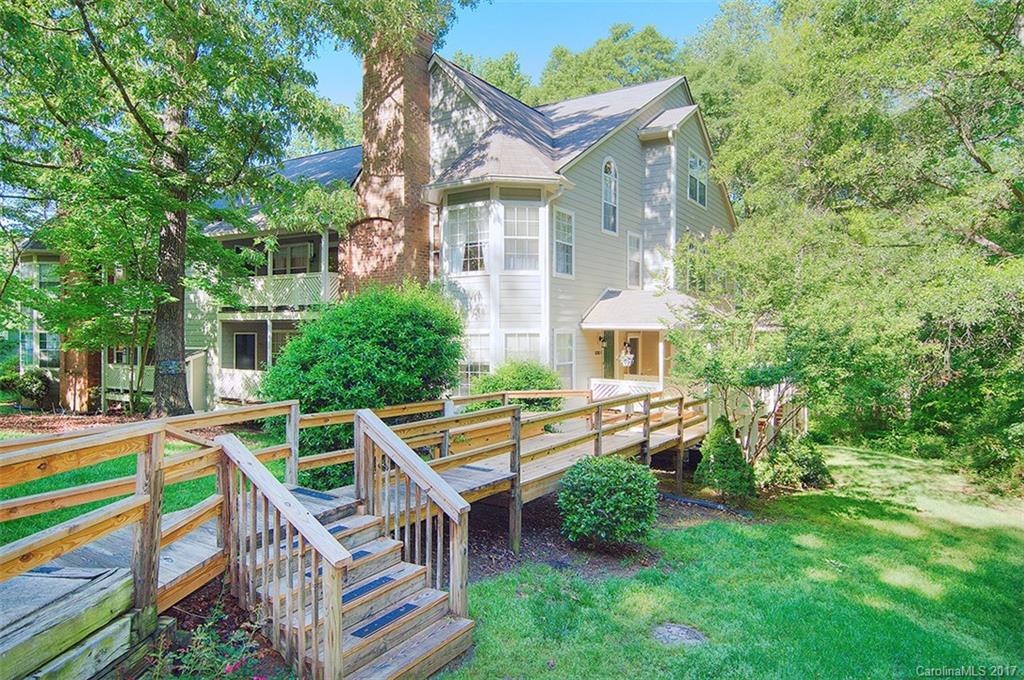 Upon entry in to this lovely neighborhood, you will be canopied by foliage. The pathway to the home is picturesque and quiet. The soaring ceiling of the 2-story great room allow puddles of light to fill the area and flow in to the sunroom.  In addition to two large bedrooms on the first level are two multipurpose rooms in the loft.  The entire home is nicely updated including the flooring and bathrooms. Enjoy afternoon strolls on the nearby greenway and an easy commute to Southpark and I-77.