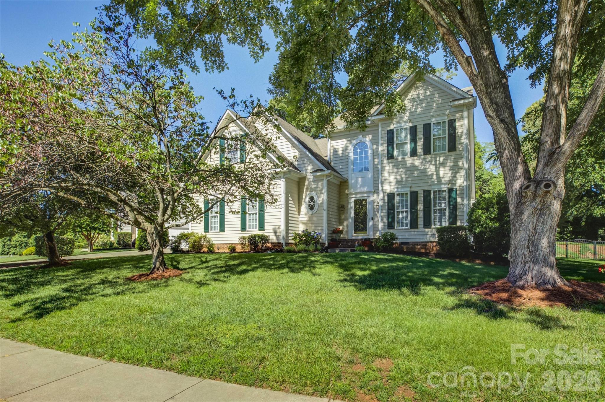 Exceptional Rea Road / Blakeney Location! Enjoy the convenience of being just a short walk to the Blakeney Shopping Center, featuring popular restaurants, great shopping, and a Harris Teeter grocery store. With top-rated schools nearby and easy access to I-485 and uptown Charlotte, you just can't beat this location! The home offers the best of both worlds with its convenience and privacy. This home welcomes you with an entry foyer that opens to the formal dining room and a guest bath. The kitchen has lots of cabinets, a sitting island, and oversized ceramic tile flooring. The breakfast area is surrounded by windows for lots of natural lighting. The two-story great room has a large fireplace and a fan light. The main-level primary suite features a tray ceiling and a large walk-in closet. The primary bath has dual sinks, a glass corner shower, and a soaking tub with a picture window above. Upstairs, you will find 3 large rooms, all with good-sized closets. One bedroom has additional side-eave storage areas. There is also a loft area that is perfect for a home office, study area, or flex space. One of the home's standout features is the stunning screened porch with a vaulted ceiling, overlooking the private fenced yard and cute storage shed. This peaceful setting makes you feel like you are in a mountain retreat. The home combines spacious living, sought-after schools, and an unbeatable location. This is an opportunity you will not want to miss!