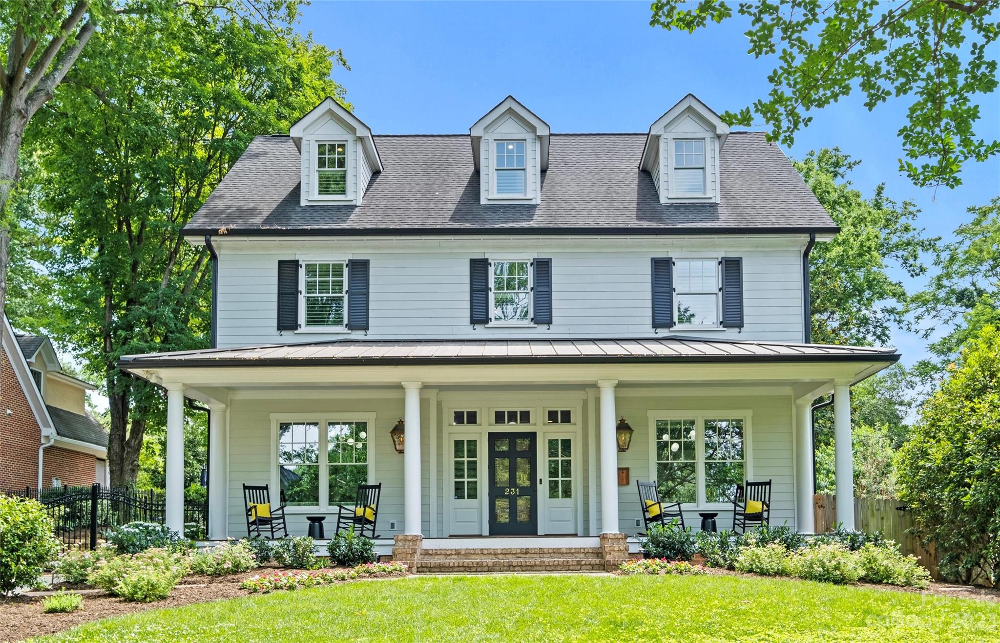 Modern take w/quintessential southern charm in this custom built Myers Park home on tree-lined streets in perfect location! Walking distance to shops/café’s/boutiques/grocery stores/restaurants. Access to scenic Greenway w/walking/biking trail. High ceilings, custom wainscot, hardwood floors! Updated modern light fixtures + stylish aesthetic make this home truly special. Open floorplan w/kitchen opening to FR w/coffered ceilings,+ gas fireplace. Light-soaked home office w/built ins. Kitchen w/huge center island, Thermador appliances, double ovens, walk in pantry w/built in storage. Dutch door to drop zone & full length front & rear porch w/seating area & fireplace w/gas starter. Primary bedroom up w/walk in closets & large bath w/oversized shower & garden tub. 3 large additional Br's all En suite designer baths. Huge 3rd floor w/plenty of flex space for media/game room/office + full bath! Car lover’s Dream! Oversized 3 car detached gar. heated & cooled. Beautifully landscaped yard!