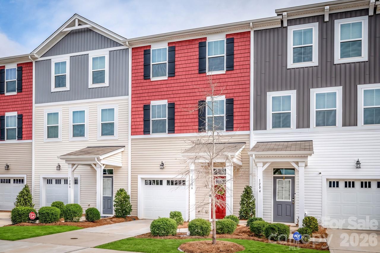 Welcome home to this beautifully designed, like-new, 3-story townhome offering upscale finishes, flexible living spaces, and low-maintenance convenience - perfect for today's lifestyle. The main level welcomes you with a spacious foyer and a versatile flex room that can easily serve as a bedroom, home office, or additional living space complete w/half bath and access to the backyard patio - perfect for relaxing or entertaining. The second floor showcases a bright, open layout ideal for everyday living and hosting. Enjoy the generous great room with private balcony, an expansive dining area and a gourmet kitchen featuring granite countertops, an oversized center island, stainless steel appliances, a pantry and abundant cabinetry for storage and functionality. Retreat to the third floor where you’ll find the well-appointed owner’s suite complete with a walk-in closet and a private ensuite bath featuring a double vanity and walk-in-shower. Two additional bedrooms, a full hall bathroom and a conveniently located laundry area complete this level. Residents of the community enjoy a carefree lifestyle with included lawn care and access to exceptional nearby amenities including the world-class U.S. National Whitewater Center offering endless outdoor recreation. Shopping, dining, parks and entertainment are just minutes away, with easy access to major commuter routes.