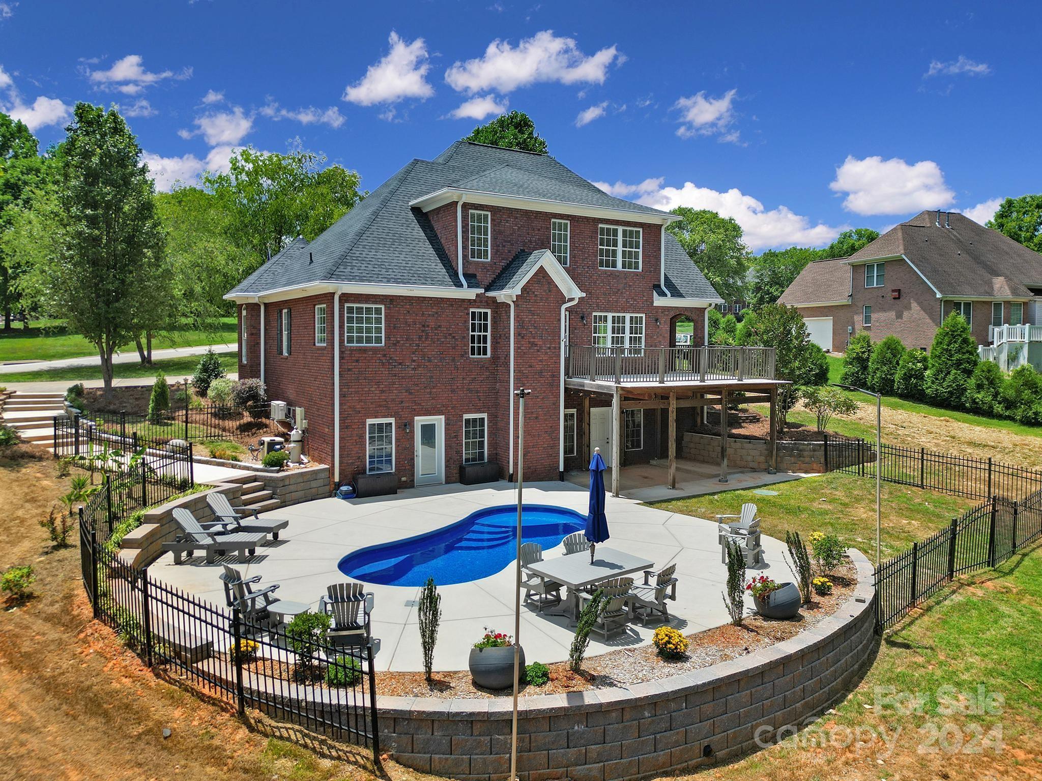 Nestled on a spacious lot spanning over an acre of serene landscape, this exceptional home offers a harmonious blend of comfort, luxury, and practicality. Recently upgraded with a heated in-ground pool (with smart features) and a brand-new roof (2024), it creates an inviting outdoor sanctuary perfect for year-round enjoyment and relaxation. Inside, the home impresses with a fully finished basement that provides generous additional living space, ideal for hosting gatherings, parties, or whatever it is your prefer. The basement adds versatility to the home, accommodating various lifestyle needs with its ample room for recreation, hobbies, or even a home office. Practicality meets peace of mind with essential amenities such as a whole home generator and water softener, ensuring uninterrupted comfort and convenience for the homeowners. These features not only enhance daily living but also provide reassurance during unexpected events, making the property both functional and reliable.