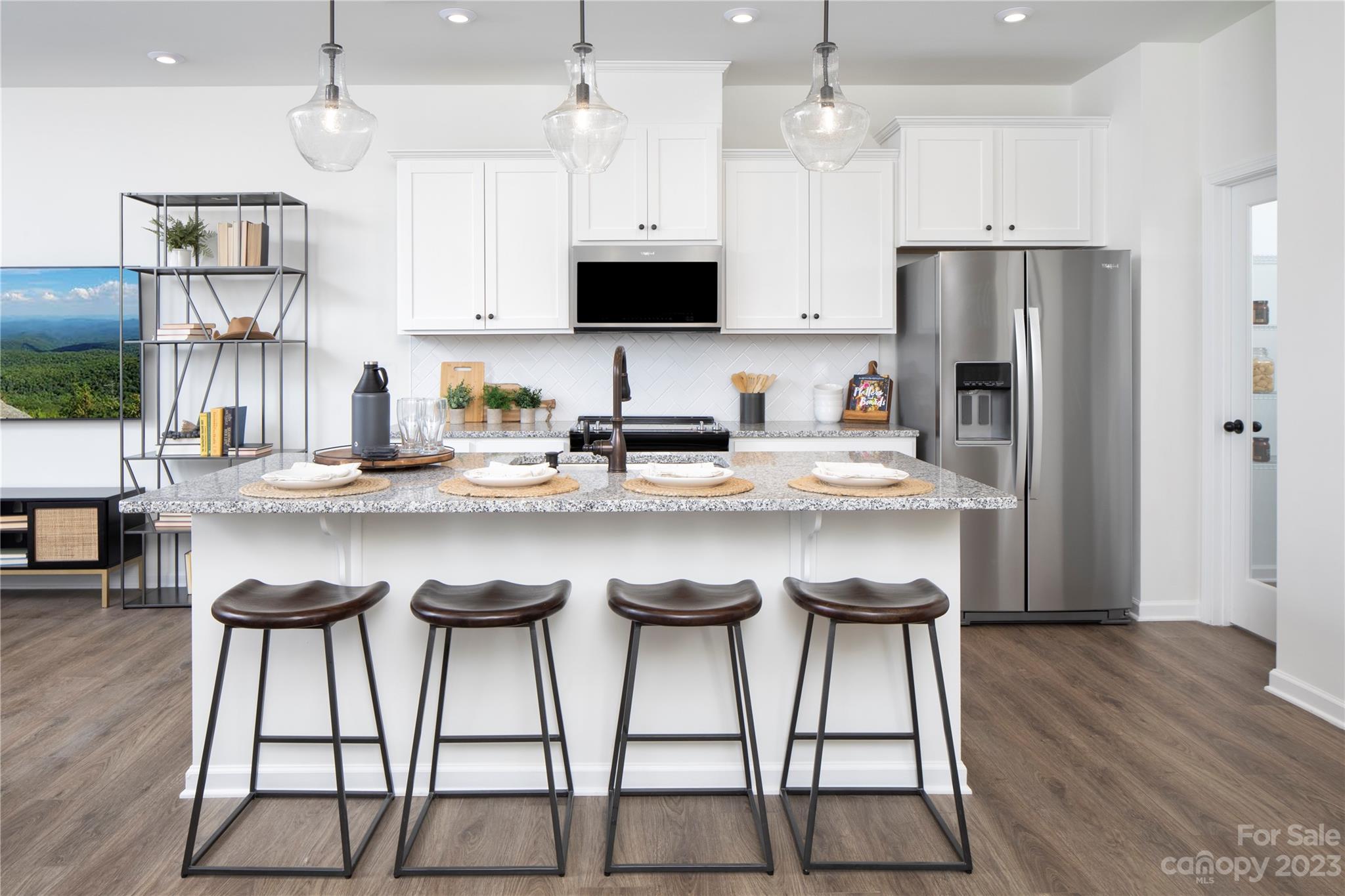 Brand New Townhome! Location...Location...Location! This popular Adriana floorplan has the living space privately tucked away in the back of the home. 3 beds plus loft, iron spindle stair railings, gorgeous kitchen, quartz kitchen and bathroom countertops.  Available for a June Closing.