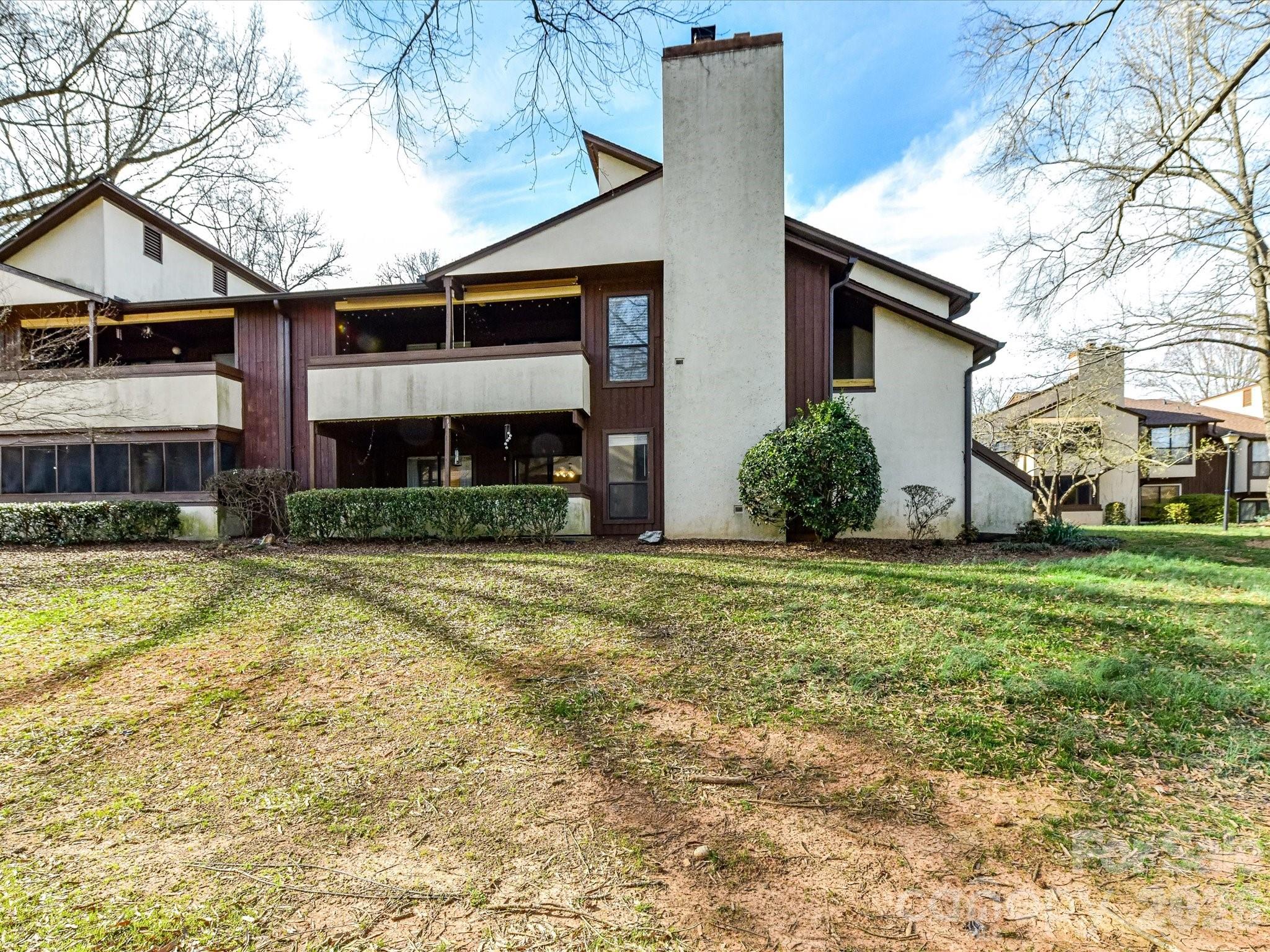 Welcome to this 1st-floor end-unit condo in the Brandywine. Offering 2 bedrooms, 2 full bathrooms, and approximately 1,120 square feet, this condo features a practical open layout with a spacious living room, dining area, and kitchen that work well for everyday living and entertaining. Laminate flooring runs through the main living areas including the bathrooms, while both bedrooms have carpet for added comfort. The split-bedroom plan gives added privacy, and the primary suite includes its own full bath and walk in closet. Enjoy the enclosed patio for morning coffee, extra outdoor living space, or a quiet place to relax. This condo also includes a laundry closet, 2 exterior storage closets, 2 parking spaces and access to the Brandywine community amenities, including a pool and pond. Conveniently located in Charlotte, this home offers low-maintenance living in a well-established community. All fireplaces are non-functional and not allowed to be used per the HOA. Currently tenant occupied until June 30, 2026.