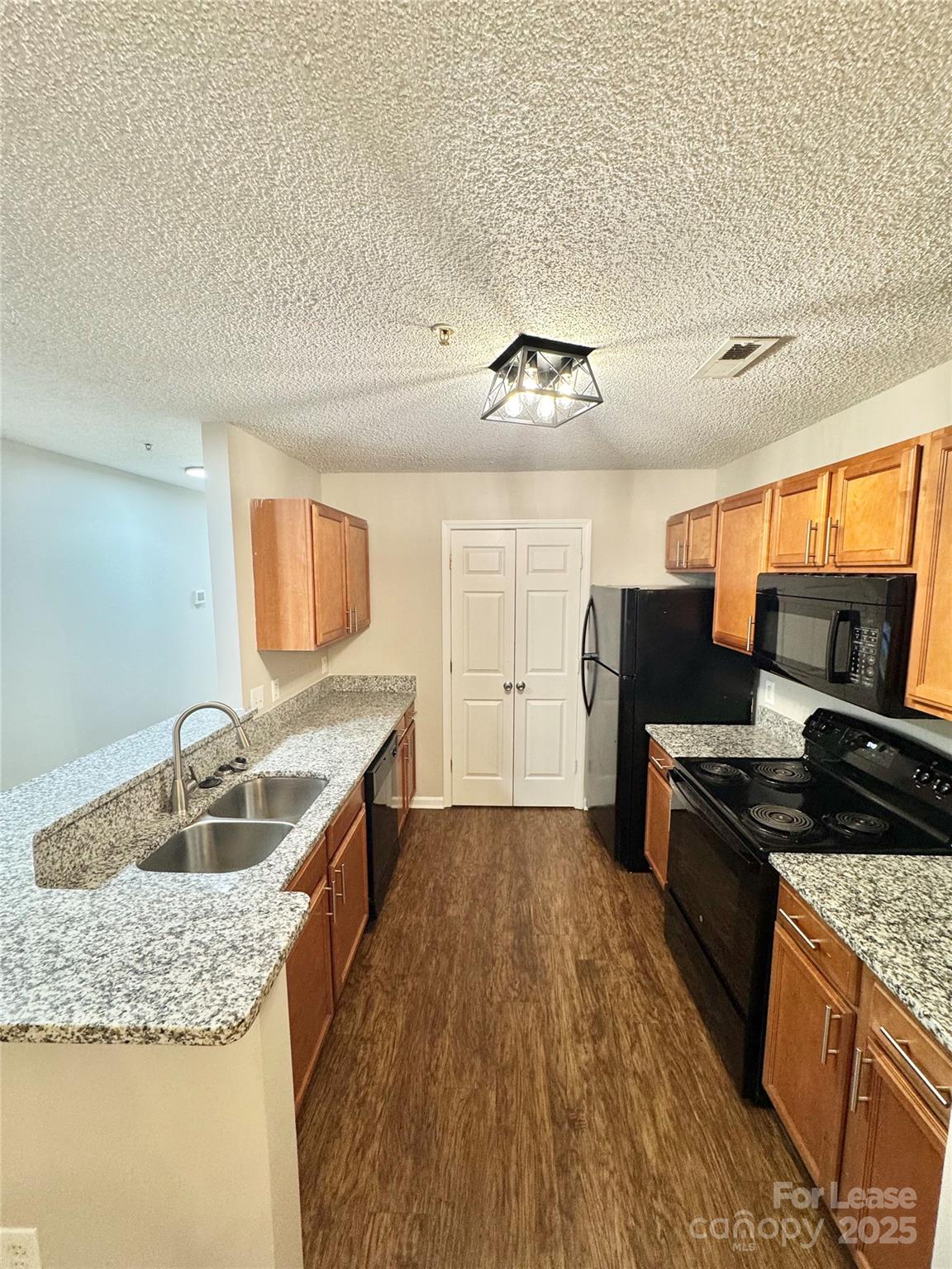 Experience modern comfort in this spacious 2-bedroom, 2-bathroom apartment perfectly located in beautiful Fort Mill, SC. Designed with an open floor plan, this home offers a seamless blend of style and functionality. The kitchen features granite countertops, ample cabinetry, and a contemporary layout ideal for cooking and entertaining. Enjoy the convenience of washer and dryer connections in a dedicated laundry closet and unwind on your private covered deck, perfect for relaxing outdoors.