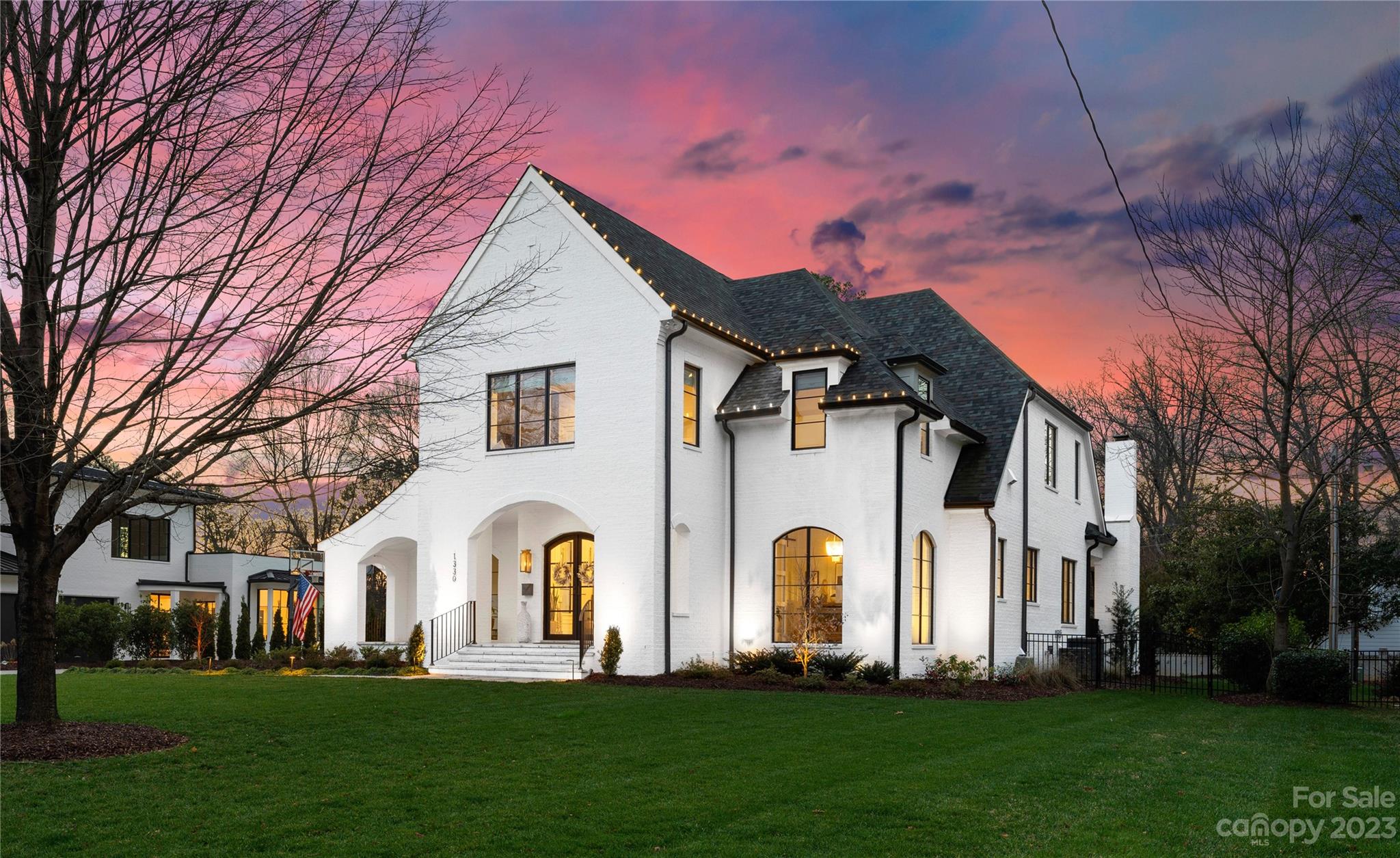 Nestled within Providence Park's coveted street—Rembrandt Circle, this home stands as a hidden gem, boasting a flat lot with unparalleled street presence. Its elegant facade, adorned with painted brick, effortlessly harmonizes with the abundant, self-sustaining landscaping. Step inside the main level, where a welcoming foyer and a sunlit study adorned with floor-to-ceiling windows awaits. This home was meticulously crafted with attention to every detail. The open design seamlessly unites the kitchen, living, and dining areas, showcasing premier Wolf/Subzero appliances, a wet bar, and a spacious walk-in pantry. The primary suite on the main floor boasts vaulted ceilings, an ensuite bathroom, and a generous walk-in closet. The upper level features four additional bedrooms, three baths, a bonus room, a recreation space, and a dedicated laundry area. Outdoor amenities include covered front and back porches and a patio, complete with a fireplace and opulent blue stone tile.