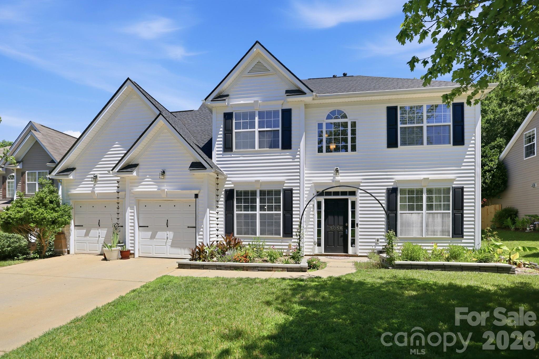 Nestled in one of Indian land's most sought after communities, this move-in ready home in Legacy Park offers the perfect blend of space, versatility and convenience. Featuring five bedrooms, three full baths and a dedicated home office, this thoughtfully designed floor plan accommodates both everyday living and effortless entertaining. Just off the entry, french doors lead to a private office ideal for working from home, studying or creating a quiet retreat. The open concept layout seamlessly connects the kitchen, dining area and living room creating a comfortable gathering space for family and friends. The updated kitchen features stylish white cabinetry, granite countertops, a gas range and a functional pantry. Upstairs you will find the primary bedroom and three secondary bedrooms and the updated hall bath complete with a refreshed vanity. The spacious primary suite offers a relaxing retreat with an oversized walk-in closet and refreshed ensuite bath. Step outside to enjoy private wooded backyard setting designed for relaxation and entertaining. The extended patio fire pit creates the perfect outdoor living space for gatherings year round. Legacy Park's exceptional amenities include a resort style pool with two story water slides, indoor and outdoor basketball courts, a fitness center, soccer field, tennis court, pickleball court, volleyball court and a stocked fishing pond. Conveniently located less than 15 minutes from Ballantyne and I-485 with easy access to Highway 521. You'll enjoy just being minutes from shopping dining a brand new Costco a Super Target and the YMCA.