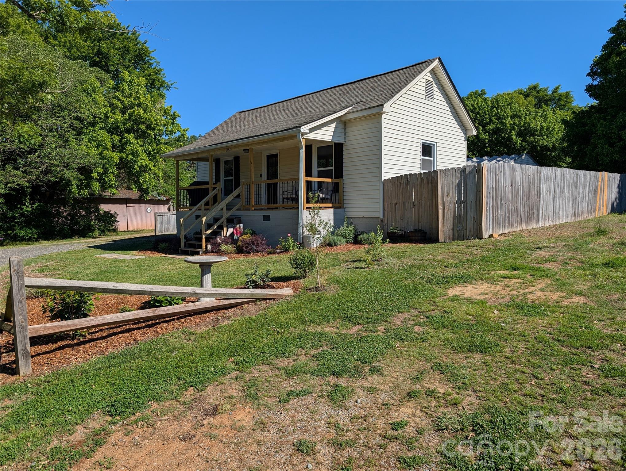 Located in Concord, North Carolina, this charming mill house beautifully blends timeless character with thoughtful modern updates. Featuring 2 bedrooms, 1 full bath, 1 half bath, and approximately 1,140 square feet, this home offers comfort, charm, and convenience in a setting that feels peaceful and tucked away while still being close to everything Concord has to offer. From the moment you arrive, you’ll appreciate the inviting curb appeal and classic mill house character that make this home truly special. A newer roof and newer HVAC system provide peace of mind and add tremendous value for the next owner. Inside, the home feels warm and welcoming with natural light flowing throughout the living spaces. The layout is functional and comfortable, making excellent use of the square footage while maintaining the cozy feel that buyers love in homes of this style. The updated kitchen serves as the centerpiece of the home, offering a tasteful blend of charm and functionality. With refreshed finishes, ample cabinet space, and a practical layout, the kitchen is ideal for everyday living, entertaining guests, or simply enjoying your morning coffee. Outside, the property continues to impress with a large shop located behind the home, offering endless possibilities for storage, hobbies, projects, or a workshop space. The fenced backyard creates a private setting perfect for pets, entertaining, or relaxing evenings outdoors. Raised garden beds provide an ideal opportunity for gardening enthusiasts or anyone looking to enjoy homegrown flowers, herbs, or vegetables.