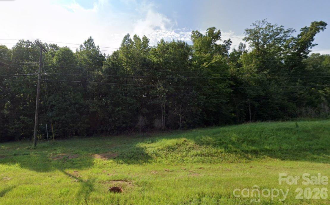 Nearly one-acre corner lot offering an exceptional opportunity to build your dream home or invest in a prime piece of land. This property has already been “perc-tested” and is county-approved for a septic system, making it ready for construction. With its desirable corner location and build-ready status, this lot provides both convenience and value. Priced competitively and prepared for immediate development, this opportunity will not last long—secure it before it is gone.