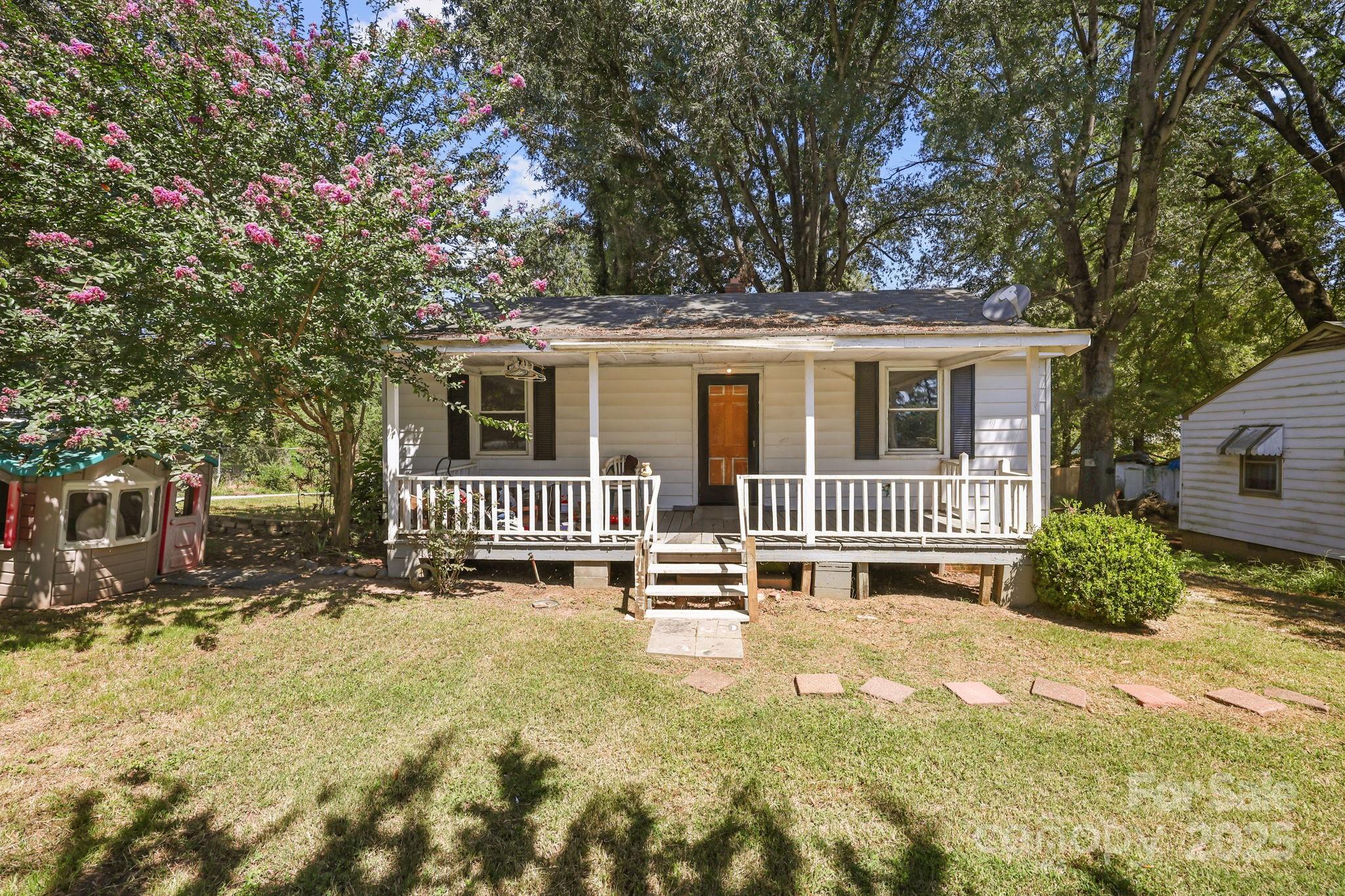 ***BACK ON MARKET DUE TO WINNING BIDDER NOT PROVIDING FUNDS!!!***
This 2 bedroom, 1 bath home in growing Kannapolis is full of potential and priced well-an excellent opportunity for investors or handy homeowners to build equity fast. Situated on a corner lot outside the city limits, this home has hardwood floors that would gleam again with some TLC. The home also features a spacious kitchen, unfinished add on, and a charming front covered porch-perfect for your favorite rocking chairs. Outside, you'll find multiple storage sheds and a detached garage. Please note that this is a judicial sale. If you're unfamiliar with the process, your agent will be happy to guide you through it. Cash only, as is-no repairs.