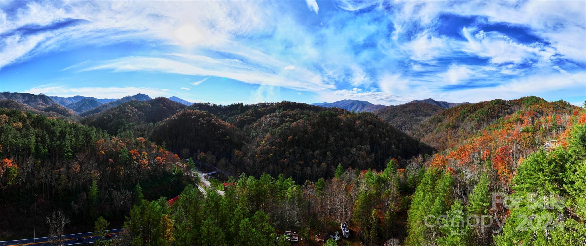 One acre lots with long range views in Nantahala Gorge, one mile from NOC! This lot has easy access with a 15 minute drive to Bryson City and just minutes to NOC or Fontana Lake. The ridgetop has incredible views of the upper Wesser and Silvermine ridges, and Cheoah Bald. No restrictions and no HOA dues, camp near the river all summer!