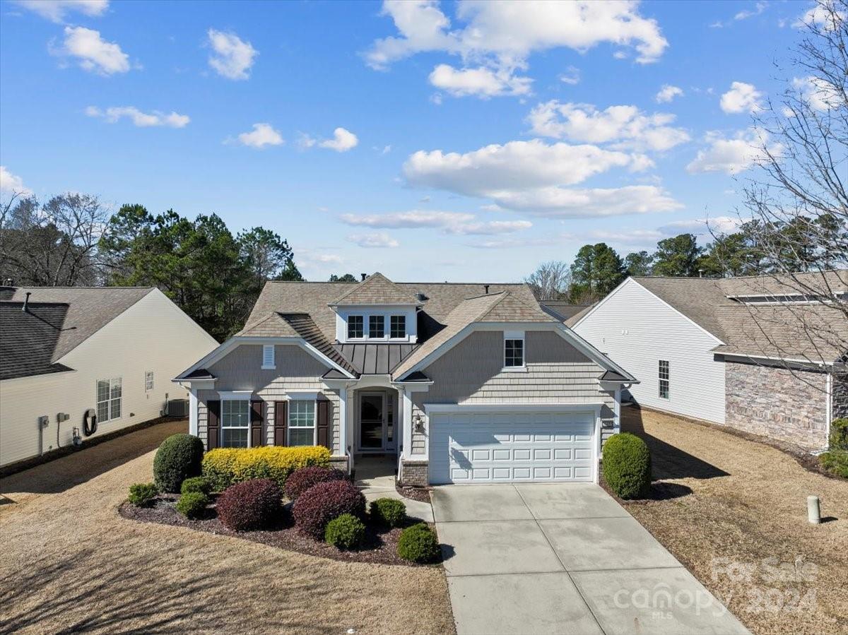 Welcome to this cozy home in the desirable 55+ community of Sun City Carolina Lakes! Enjoy the spacious great room with a cozy gas fireplace, flowing seamlessly into the open kitchen featuring granite countertops, tile backsplash, stainless steel appliances, & a breakfast bar. French doors lead to a versatile study, perfect for a home office or hobby room. The primary bedroom boasts a trey ceiling, walk-in closet, & luxurious ensuite bath with a soaking tub and glass-enclosed shower. Two additional bedrooms offer flexibility & access to a full bath. Step outside to the charming multi-season room & extended patio with retractable awning & custom landscaping for outdoor enjoyment & privacy. This home comes with a complete refresh including a fully painted interior & newly added sky lights. Don't miss out on the amenities of this golf club community, including nearby shopping, dining, & entertainment options!