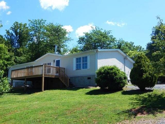 Three bedroom, 2 bath doublewide on a private .98 acre lot. Just 10 minutes to Weaverville. Sunny open floor plan, spacious eat in kitchen. Living room with gas fireplace. Huge master bath with garden tub. Relax on the private front deck. Gorgeous mtn. view with some trimming. New pressure tank and well pump in 2015, new architectural shingles in 2015, new central air/heatpump in 2015. Add your personal touch and make this house your home.