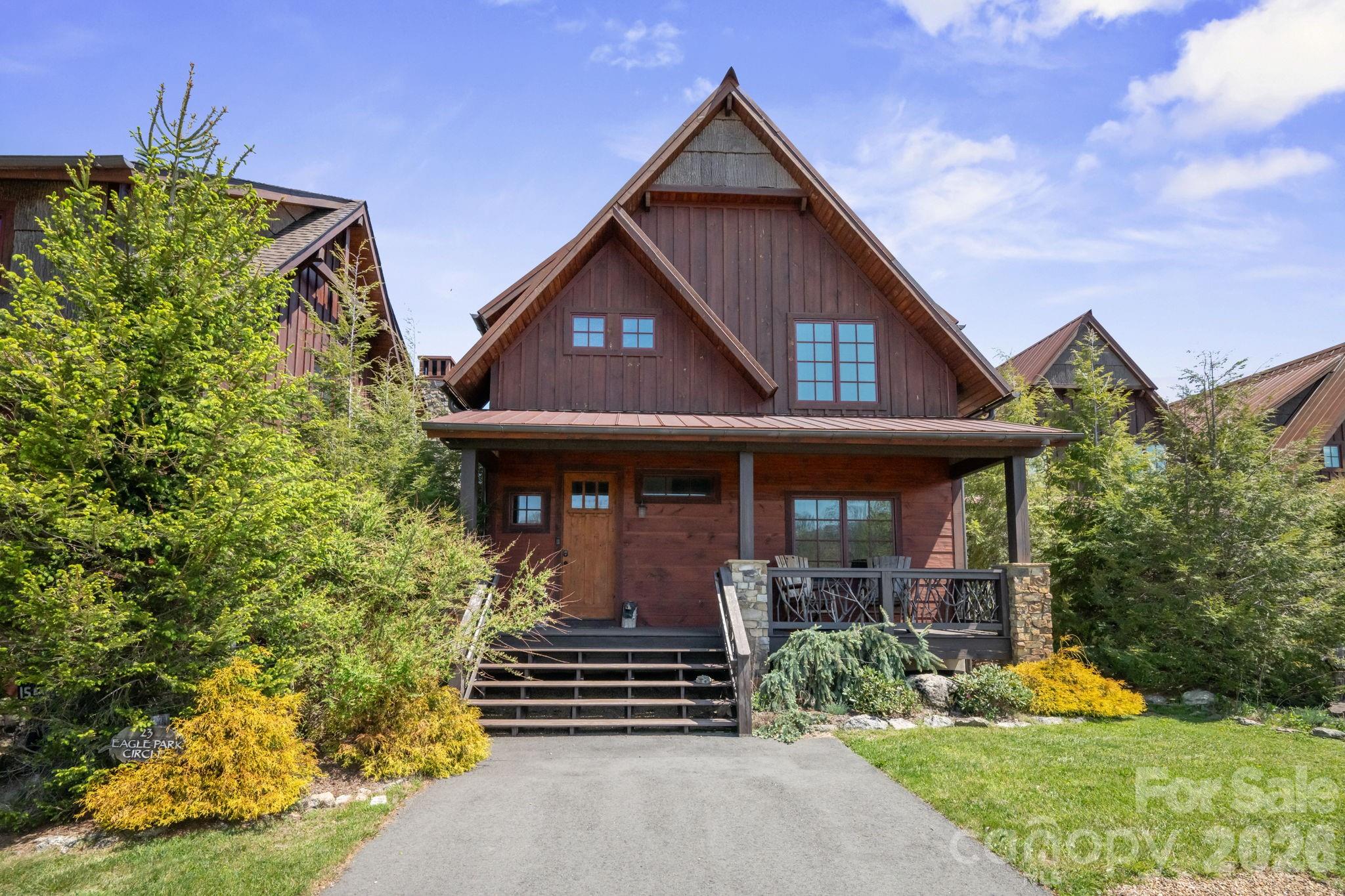 Experience elevated mountain living in this beautifully positioned home within the highly sought-after Lodges at Eagles Nest. Located in the gated enclave of Eagle Park, 23 Eagle Park Circle offers a rare blend of privacy, convenience, and breathtaking long-range mountain views—an exceptional value at this price point.

Thoughtfully designed for both comfort and versatility, the home features three distinct sleeping areas, including two spacious bedrooms with en suite full baths and a flexible loft configured with bunks. Offered fully furnished, including a sleeper sofa, the home comfortably accommodates up to 10 guests—ideal for hosting family and friends or maximizing rental potential.

Designed for effortless enjoyment, this low-maintenance property is perfectly suited as a turnkey mountain getaway or investment opportunity. The open-concept living areas flow seamlessly to the outdoors, where a covered lower deck invites year-round relaxation and an upper-level deck is perfectly positioned to capture sweeping mountain vistas.

Ideally located directly across from the North Pavilion amenity area, the home offers immediate access to one of Eagles Nest’s most vibrant hubs—featuring the Sportsman’s Grill, sports fields, basketball courts, helipads, and the community’s signature Fourth of July celebrations and fireworks. Enjoy walkable access to the fitness center and Creekside Trail, along with nearby ATV trails and a short two-minute drive to Eagles Nest Winery.

With its prime location, functional layout, and ability to comfortably accommodate larger groups, this home presents an exceptional opportunity for a refined mountain retreat or high-performing rental—where luxury living meets natural beauty and outdoor adventure.