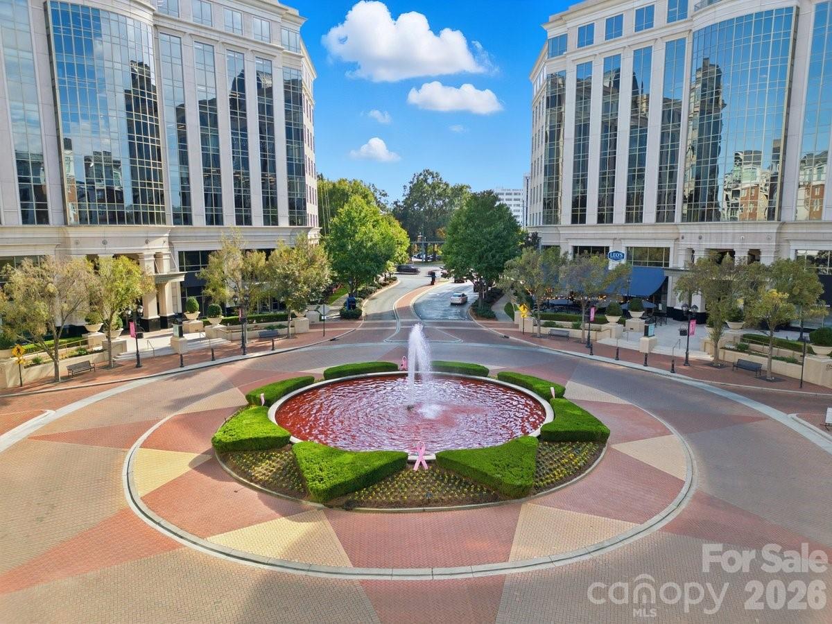 Enjoy PENTHOUSE  living with stunning views of Uptown Charlotte from this beautiful residence in the highly desirable Piedmont Row community. This open and light-filled floor plan features 10-foot ceilings and a desirable split-bedroom layout, offering both comfort and privacy. The spacious primary suite opens to a private balcony where you can enjoy the city skyline views. The primary bath is well-appointed and has an updated walk in shower., and both bedrooms feature large walk-in closets. The kitchen is equipped with stainless steel appliances, granite countertops, and ample cabinet space.
Piedmont Row offers exceptional amenities, including a business center, clubhouse, and a rooftop pool deck with grills, a fireplace, and breathtaking skyline views—all just steps from this conveniently located residence. Enjoy SouthPark's premier dining, shopping, and entertainment within walking distance. Completing this exceptional property are two secure, gated parking spaces located on the 6th floor (Spaces D-80 and D-104).