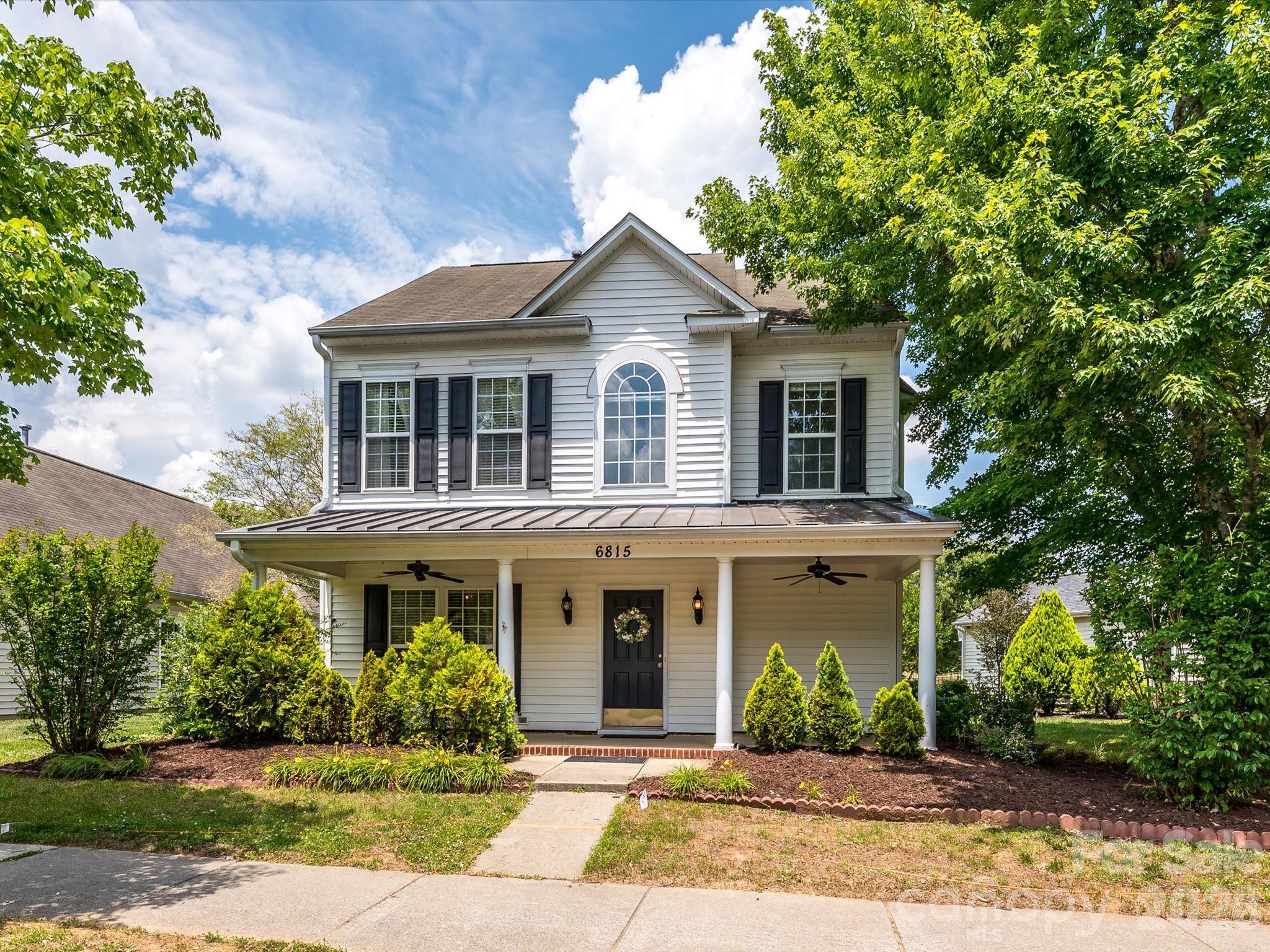 Welcome home to this beautifully maintained home in a highly desirable neighborhood just minutes from top-rated schools, shopping, dining, and everyday conveniences. Relax on the charming Southern-style front porch complete with ceiling fans—the perfect spot for morning coffee or evening conversations. Inside, you'll find gleaming hardwood floors, abundant natural light, elegant crown molding, and an inviting open floor plan designed for both everyday living and entertaining. The spacious kitchen features granite countertops, stainless steel appliances, a pantry, and seamless flow into the breakfast area and family room. Gather around the cozy gas fireplace on cool Carolina evenings or step outside to enjoy the private patio for outdoor dining and relaxation. The main-level office with French doors provides an ideal work-from-home space, study, or music room. Upstairs, the oversized primary suite offers two generous closets, including a walk-in closet, providing exceptional storage. Additional bedrooms are bright and spacious, with one featuring beautiful hardwood flooring. 
A detached garage with its own window A/C unit creates the perfect workshop, hobby space, or flex area. As an added bonus, the neighborhood pool and playground are conveniently located directly across the street. This is a perfect investment property...current tenant  in home until end of July 2026. Details in agent remarks.
Freshly painted and lovingly cared for, this move-in-ready home combines comfort, charm, and an unbeatable location. Don't miss your opportunity to make it yours!