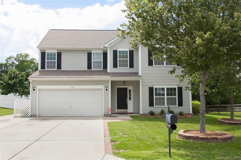 MASTER ON MAIN! Better then new home located in the highly desirable Clover Schools -4 bedrooms, 2.5 baths, a spectacular custom designed open kitchen with amazing granite breakfast bar 42"kitchen cabinets, Formal dining room, 9 foot ceilings, fireplace in Great room 4ft master extension. Many upgrades-new beautiful flooring through out, new paint. Built in closet system in master closet. Upstairs has a great activity-loft area & 3 additional bedrooms, inviting back yard w patio & storage bldg