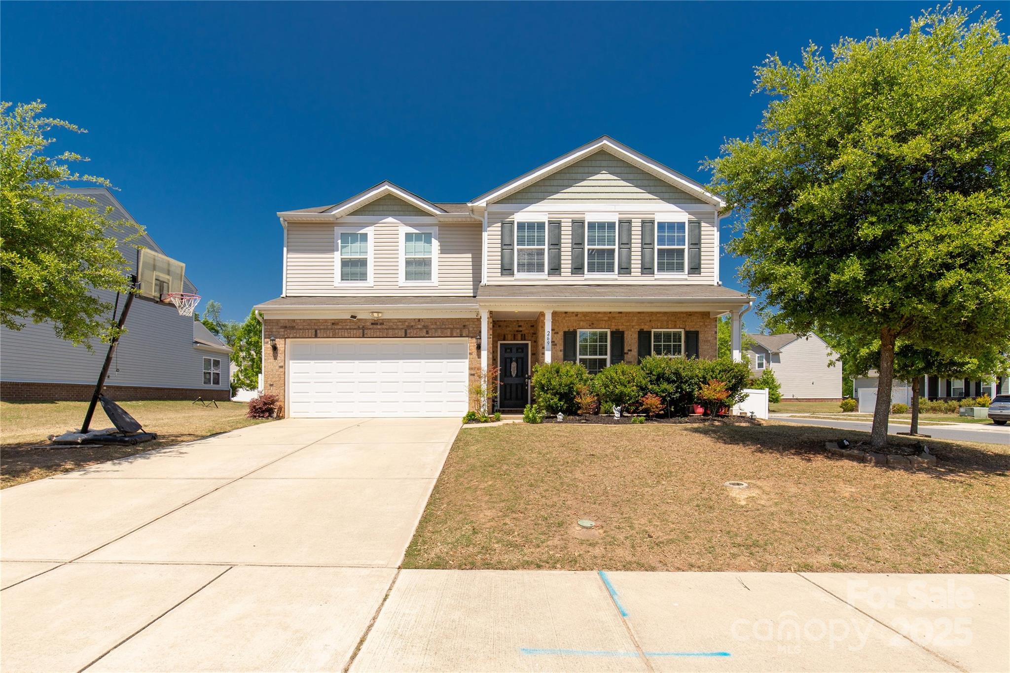 Welcome to this spacious 5 bedroom home located in a prime area of Fort Mill near restaurants, shopping and close to highway 77! Walk into the entry and be greeted by a flex space for a dining room or office. The kitchen has ample counter space, a breakfast bar and tons of cabinetry! The eat-in area can house a large table for the family and opens to a spacious living room! Enjoy a book in the bright sunroom! Off the living room you will find a 5th bedroom with an adjoining closet. This room could also be an office situated where occupants can work privately, without disruption. . The main floor is covered with prefinished hardwood. Upstairs you will find 3 sizable secondary bedrooms with large closets, a full bath, loft area and laundry room! The massive primary bedroom can easily contain a king sized bed! The primary bath has dual sinks, soaking tub, shower and grand closet! This home is situated on a corner lot with a flat, fenced in yard including a patio for all the backyard fun!