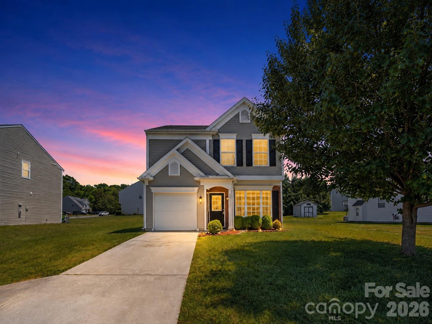 Welcome to 10410 Roundleaf Dr — a beautifully renovated 3-bedroom, 2.5-bath home offering approximately 1,500 sqft of stylish, move-in-ready living in a rapidly growing Charlotte location near UNCC. From the moment you step inside, you’re greeted by an open and airy layout filled with natural light, enhanced by higher ceilings and brand-new gleaming LVP flooring that flows seamlessly throughout the main level. The living space is anchored by a cozy accent fireplace and complemented by an updated modern light fixture, creating the perfect blend of comfort and design. The fully renovated kitchen is a true highlight, featuring granite countertops, freshly finished cabinetry with updated hardware, brand-new stainless steel appliances, and the added convenience of two pantry spaces for extra storage. Whether you’re cooking, entertaining, or just enjoying everyday living, this kitchen delivers both functionality and style. The main level also includes a convenient half bath and access to a single-car garage, offering practicality for daily living. Step outside to a flat, usable backyard — ideal for relaxing, entertaining, or creating your own outdoor setup. Upstairs, you’ll find three spacious bedrooms, including a large primary suite with vaulted ceilings that add an extra sense of openness. The primary bathroom features a double vanity, a beautifully tiled shower, and a generous walk-in closet. All bedrooms have been updated with modern light fixtures, and the secondary bathroom has been refreshed with a new vanity and lighting, giving the entire home a cohesive, updated feel. Located just minutes from UNC Charlotte, this home is perfect for first-time buyers, investors, or anyone looking to be in a high-demand rental and growth area. With easy access to shopping, dining, major highways, and everything Charlotte has to offer, this is a smart opportunity whether you’re looking for a primary residence or an investment property. Don’t miss your chance to own a fully renovated home in one of Charlotte’s most convenient and up-and-coming locations — schedule your showing today!