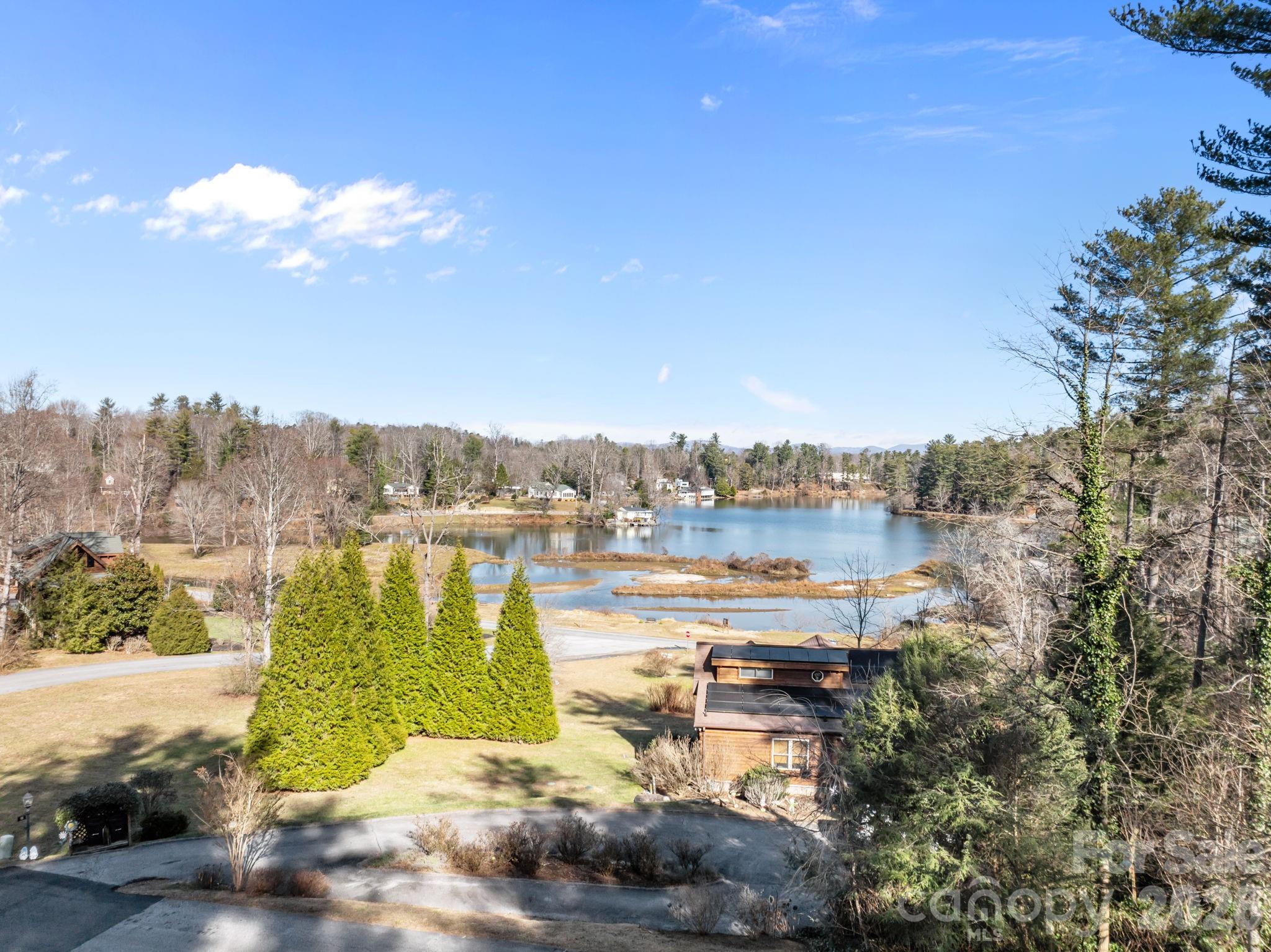 Beautiful Level Lot with Lake Views – .23 Acres
Build your dream home on this .23-acre level lot with stunning views of Lake Osceola. Located on a paved private road, this property offers both convenience and privacy in a peaceful setting. Enjoy city water access, and provisions for wastewater management have been arranged off-site for a smooth building process.
This lot combines natural beauty with accessibility—just minutes from Hendersonville’s amenities while providing a tranquil retreat. Plus, an adjacent lot is also available (MLS#4346429), offering even more possibilities for expansion or investment.
Don’t miss this opportunity to own a piece of paradise near Lake Osceola!