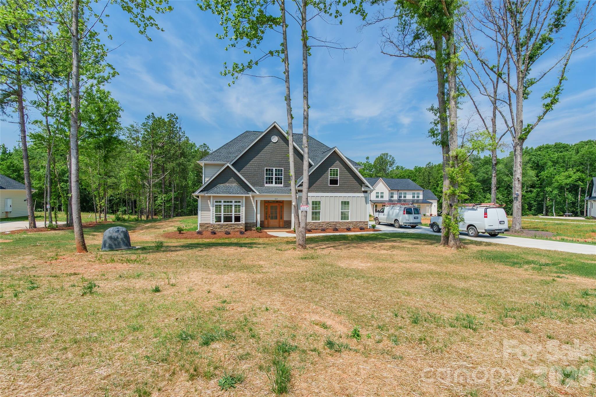 New construction home situated on over an acre! This thoughtfully designed 3 bedroom, 2.5 bathroom home offers a spacious open floor plan with modern finishes and quality craftsmanship throughout. The exterior features charming curb appeal with a welcoming front porch and a covered back patio overlooking the large private lot. Enjoy the perfect blend of peaceful surroundings and contemporary living with plenty of space both inside and out. Estimated completion is July/August, giving buyers the opportunity to make this brand new home their own before summer’s end.