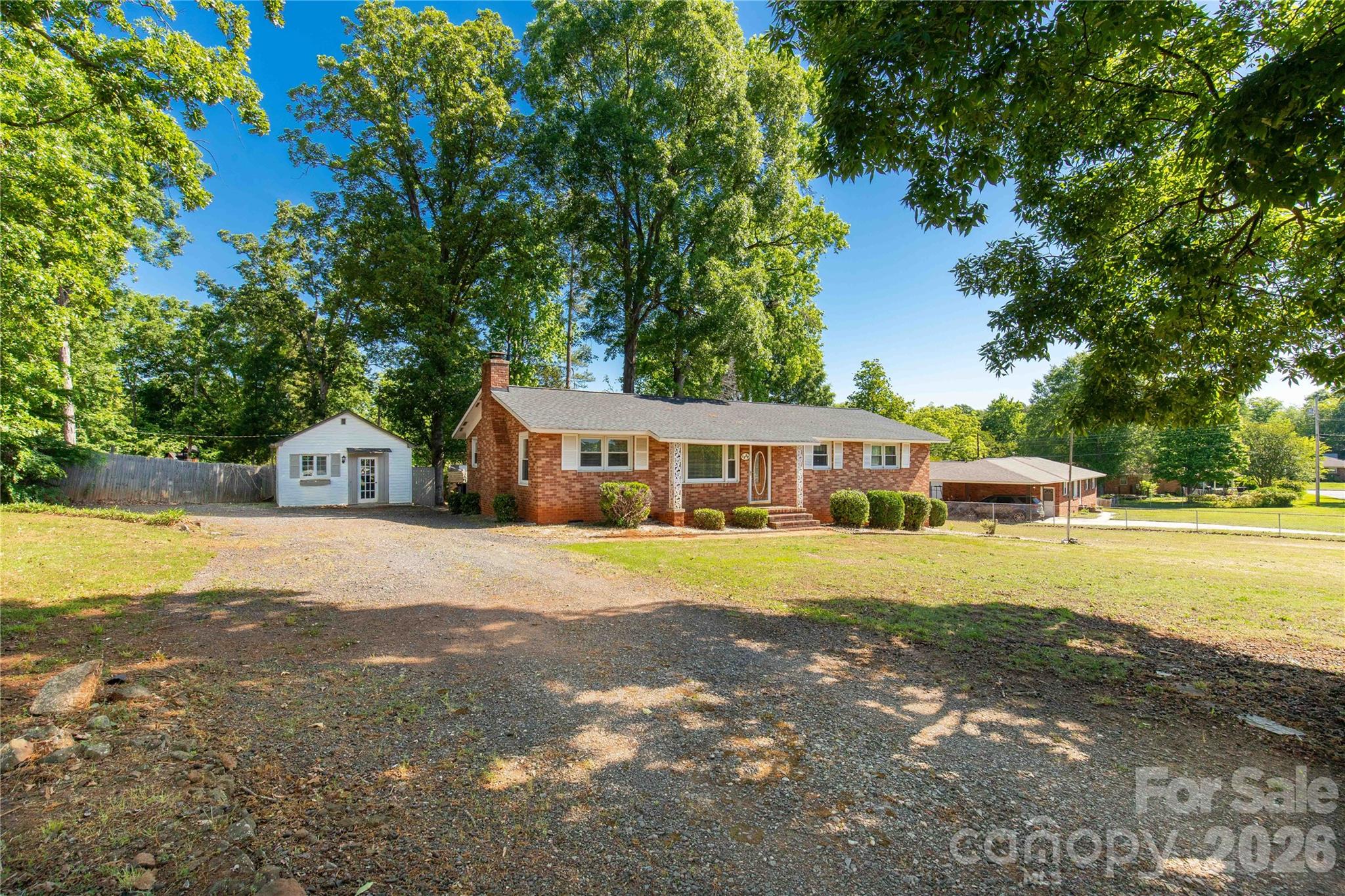 Welcome home to this charming full-brick ranch located in the desirable Oakwood Acres subdivision—no HOA! Inside, you’ll find beautiful hardwood floors and a delightful eat-in kitchen featuring butcher block countertops. Situated on a generous 0.53-acre lot, the property offers your own private retreat with plenty of space to relax or entertain. A wired storage shed conveys with the home, providing excellent additional storage or workspace. Conveniently located just minutes from the interstate, shopping, and dining, this home blends comfort, character, and accessibility all in one.  Schedule your showing today!