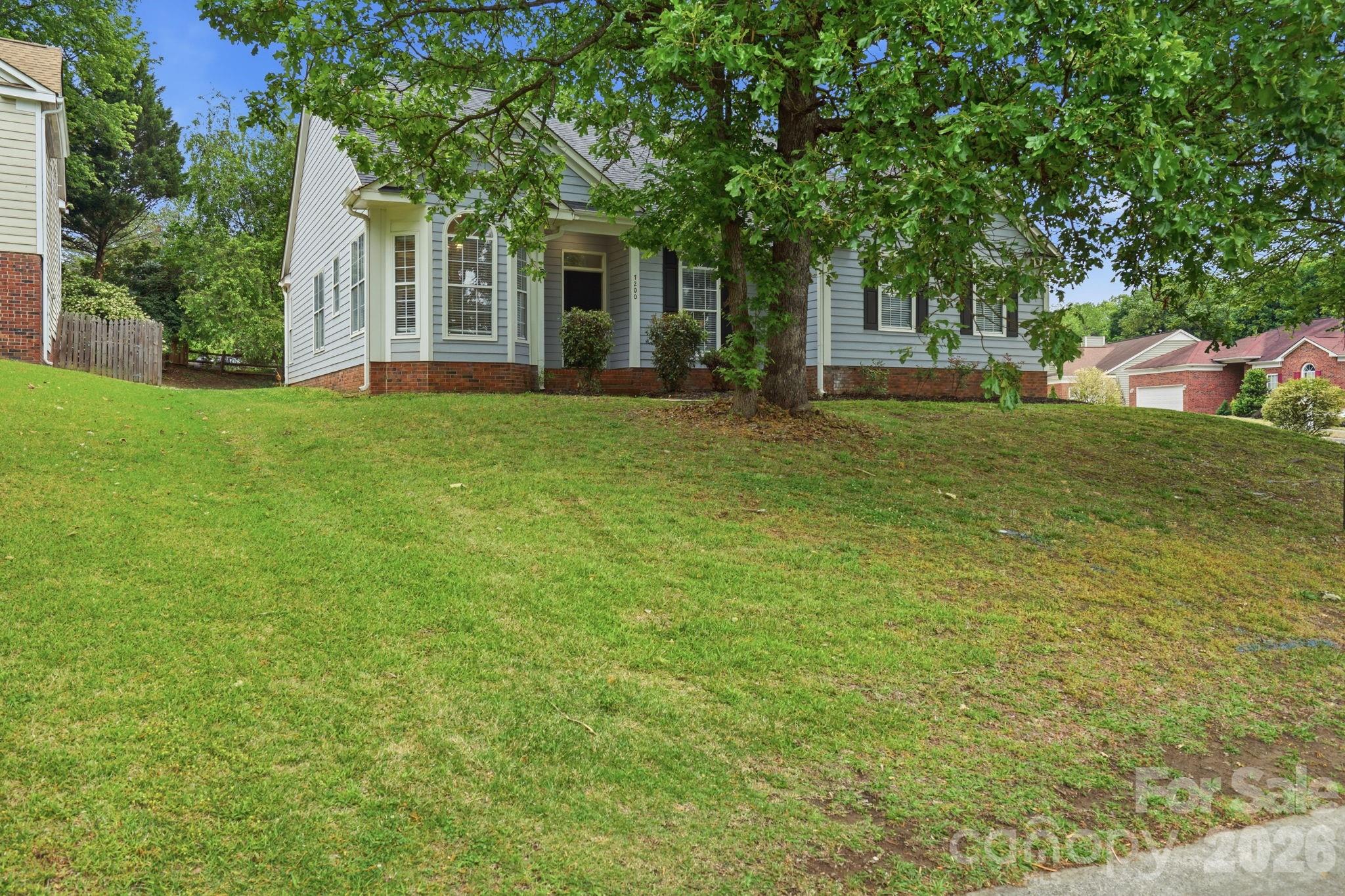 Beautiful 1-story home featuring 3 bedrooms, 2 bathrooms, and a functional layout designed for comfortable everyday living and entertaining. Freshly painted interior creates a bright, refreshed feel throughout. The living room features a fireplace, while the breakfast area is enhanced by a bay window. The primary suite includes a bay window and a spacious bathroom with double vanity, jetted tub, and separate shower. Generous secondary bedrooms offer flexibility for guests, a home office, or hobbies. Enjoy a backyard space perfect for relaxing or entertaining.

Conveniently located near shopping, dining, and entertainment, with easy access to Uptown Charlotte, Reedy Creek Nature Center and Preserve, and UNC Charlotte. One or more photo(s) was virtually staged.
