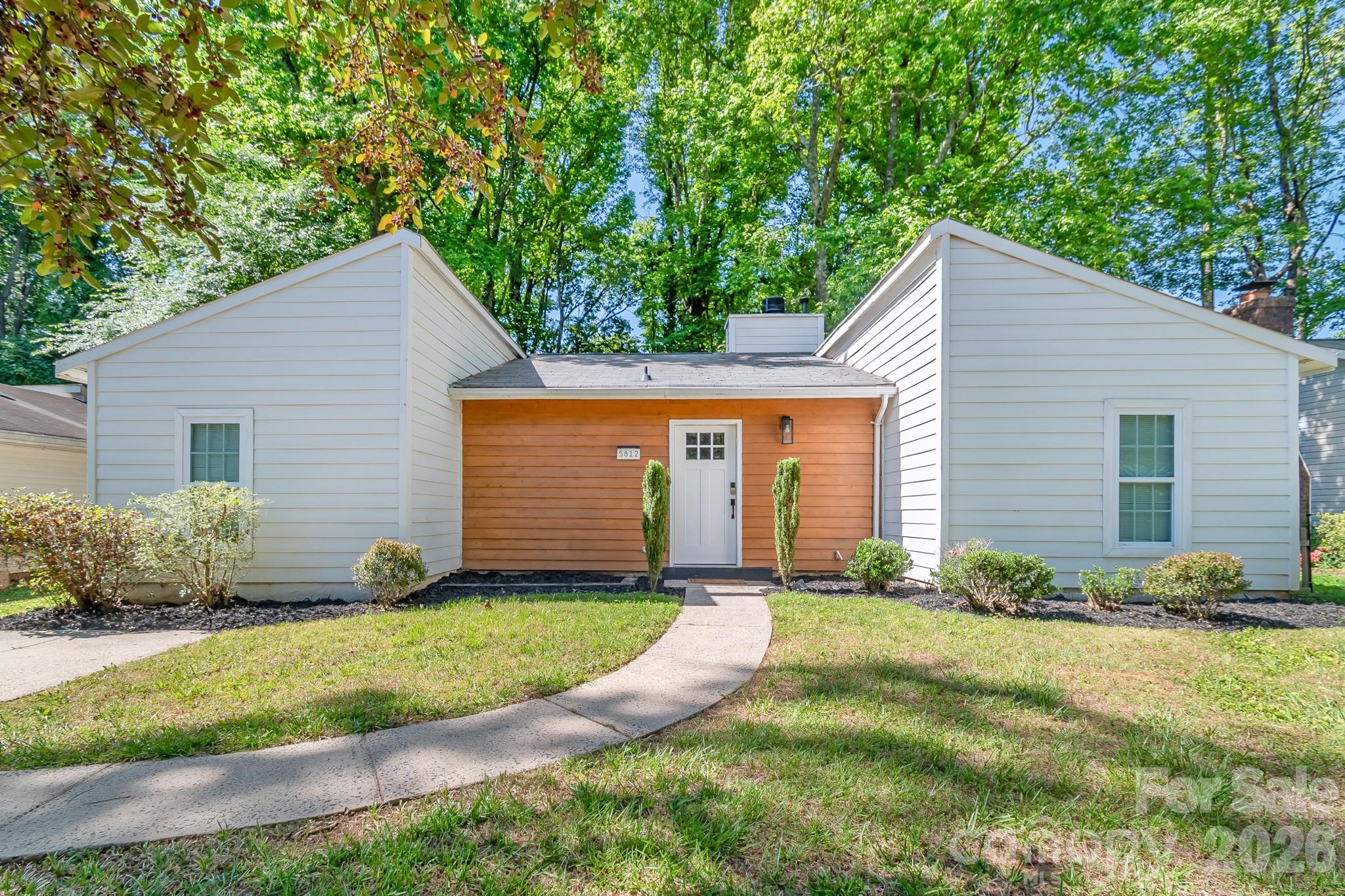 Discover this charming 2 bedroom, 2 bathroom home nestled on a 0.2-acre lot just minutes from the heart of Charlotte. Perfectly located near shopping, dining, and entertainment, this property offers convenience and opportunity in one package. With a proven track record as both a long-term rental and Airbnb, this home is ideal for investors seeking steady income potential or homeowners looking for a move-in ready property with added flexibility. The open layout home provides a comfortable living spaces, while the bedrooms and baths are thoughtfully designed for function and ease. Each bedroom features a walk in closet and en-suite bath on opposite ends of the home. Entire home has been freshly painted in March 2026. 

Step outside to enjoy the spacious treed lot in the fenced in backyard, perfect for outdoor gatherings, gardening, or future expansion possibilities.

Whether you’re searching for your next investment property or a cozy place to call home near Charlotte’s vibrant center, this property is a must-see!