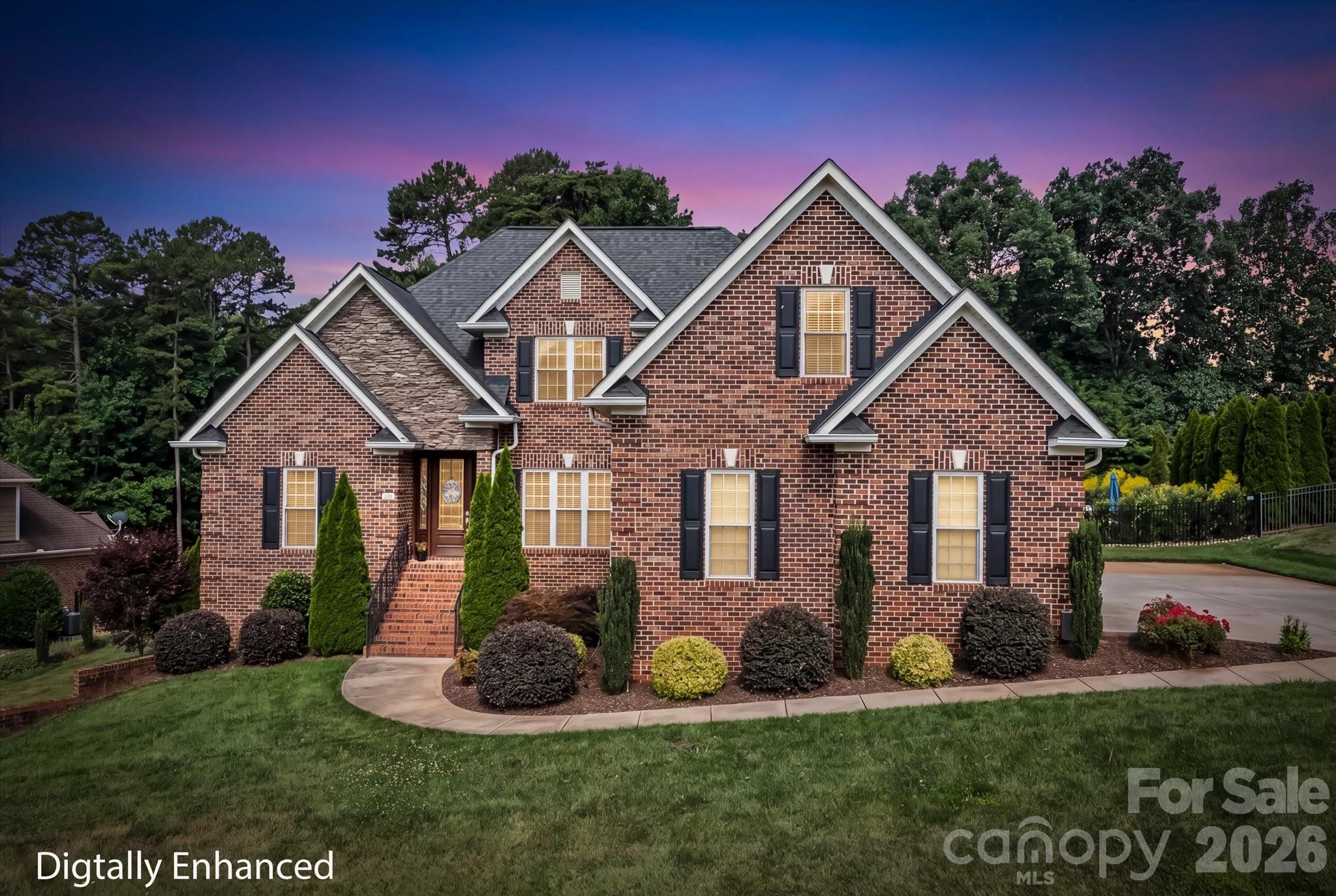 This exquisitely maintained all-brick custom residence offers 4399 square feet on a .59-acre lot with a partially wooded backdrop, creating a rare sense of privacy, lush landscaping, and no HOA fees in one of the area’s most sought-after and tranquil communities.

Inside, hardwood and tile flooring, refined custom trim, and granite countertops throughout set a sophisticated tone. The well-designed floor plan features a spacious main-level primary suite with sitting area, an oversized walk-in closet, along with a second bedroom and full bath on the main level. The kitchen and living spaces flow beautifully for both everyday comfort and effortless entertaining. Upstairs, you’ll find two additional bedrooms, a full bath, and a generous flex room above the garage, complemented by abundant storage with 
pull down attic access and walk-in attic space. The finished basement, completed in 2019, adds remarkable versatility with a full bath, media room, game room, and family room with ample storage, and a basement garage—ideal for a gym, office or hobby space. Outdoor living is equally impressive, highlighted by a custom heated saltwater pool installed in 2022, a fully fenced yard, and impeccably maintained landscaping with landscape lighting.
The finished basement, completed in 2019, adds remarkable versatility with a full bath, media room, game room, and family room with ample storage, and a basement garage—ideal for a gym, office, hobby space, or guest accommodations. Outdoor living is equally impressive, highlighted by a custom heated saltwater pool installed in 2022, a fully fenced yard, and impeccably maintained landscaping. A three-car garage, tankless water heater, and the unmistakable pride of ownership further elevate this exceptional property. Conveniently located near the lake, shopping, and top-rated schools, this home delivers the perfect balance of comfort, convenience, and privacy.

Playset and pool table can convey.
