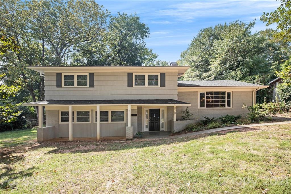 This Gastonia two-story home offers granite countertops.