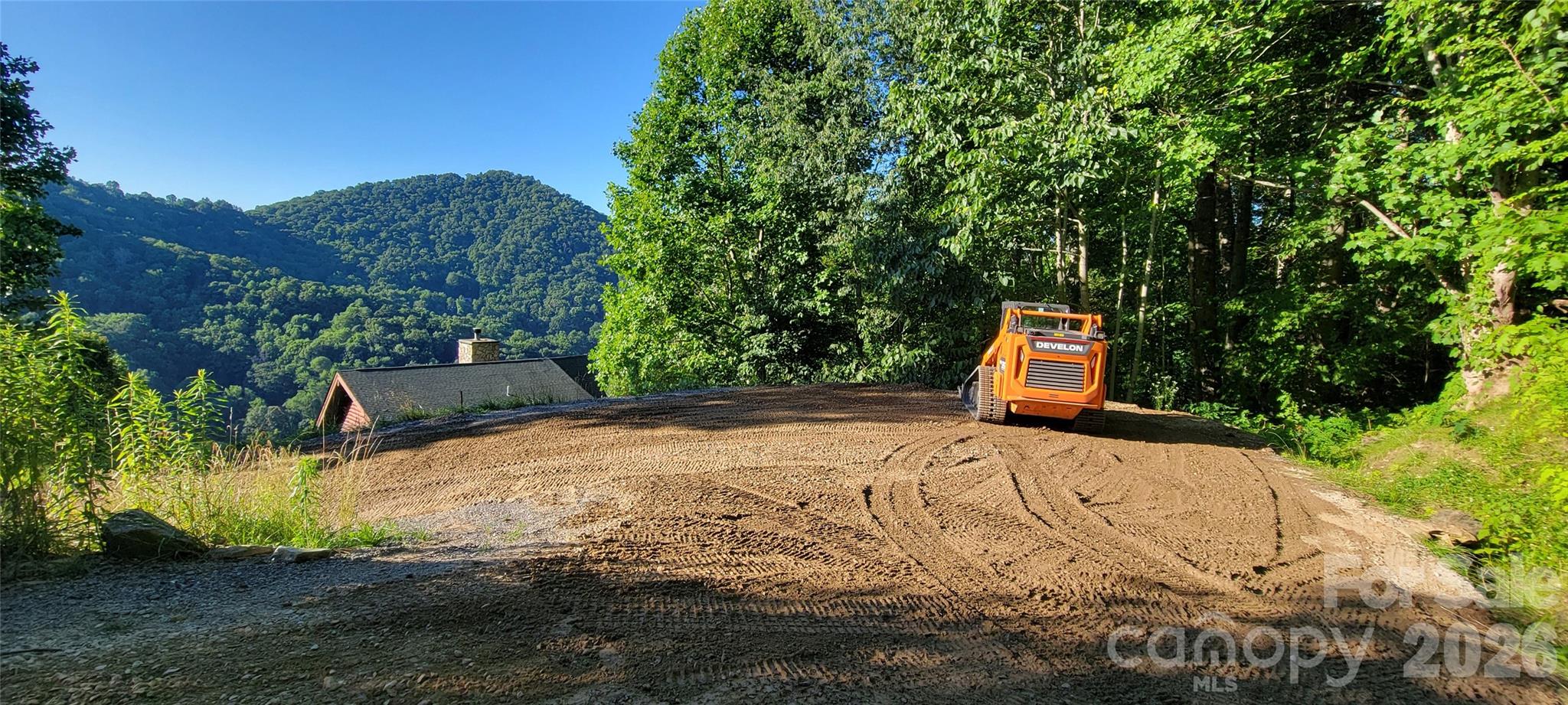 2025 milar for last 8 lots recorded with the Haywood County NC Registry.  This pretty and convenient subdivision is located within 5-7 minutes drive time to beautiful Lake Junaluska, downtown Waynesville and Maggie Valley.  Paved streets, street lights, underground electric, city sewer [currently $810/bedroom] and Maggie Valley Sanitary District water for majority of lots [with tap fee].  Potential long range mountain views with tree trimming/cutting during grading/home construction.  ***Seller is negotiable and will owner finance with balloon payment, 20 percent down, 7% APR, 36 months interest only monthly payments'.***    Call an agent of choice to preview soon!
