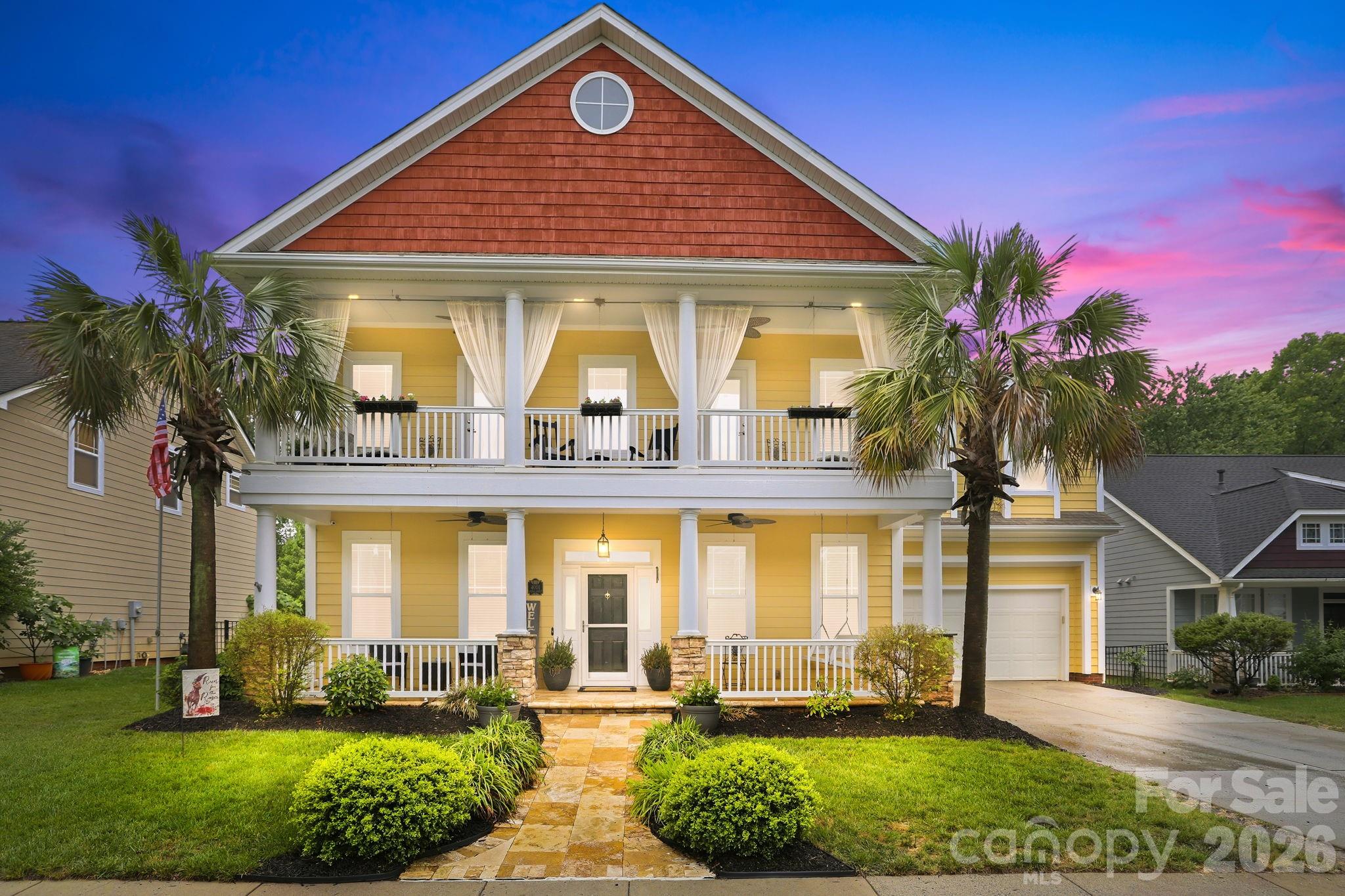 Welcome to this Charleston-inspired former model home on a premium lot in the sought-after equestrian community of Bonterra Village. Framed by palm trees and a landscaped travertine walkway, this charming double-porch home offers peaceful views of horses grazing in nearby pastures and beautiful sunrises.

Inside, natural light floods both levels of the home, highlighting the 10-foot ceilings, extensive moldings, brand new LVP flooring throughout the main level, stainless steel appliances, walk-in pantry, private study, and sunroom with vaulted ceiling. The open floor plan flows effortlessly, with abundant natural light and peaceful views of the private, tree-lined backyard from multiple angles. The glamorous formal dining room with a tray ceiling is perfect for Sunday dinners or evening meals with family and friends. The rare private, tree-lined fenced backyard features a gazebo, travertine tile outdoor areas, and a fully wired shed with electricity—ideal for storage, hobbies, or workshop use.

Upstairs, the spacious primary suite includes a vaulted ceiling, granite countertops, and a tiled walk-in shower. Both the primary suite and an additional upstairs bedroom offer direct access to the upper porch, creating a flexible layout ideal for a guest room, child’s room, or private retreat. A large bonus room offers flexibility as a media room, playroom, or optional fifth bedroom. Convenient second-floor laundry adds everyday ease. The oversized garage features windows for added natural light and extra space for storage or workspace needs. With 4 bedrooms and 3 full baths, this home offers comfort, functionality, and custom details throughout.

While relaxing on the upper porch with palm trees swaying, you feel like you are at the coast—an ideal place to unwind and enjoy the peaceful surroundings.

Bonterra Village amenities include a clubhouse, pool, fitness center, tennis, pickleball and basketball courts, playgrounds, scenic walking trails and so much more—all conveniently located near I-485 and the Monroe Bypass.