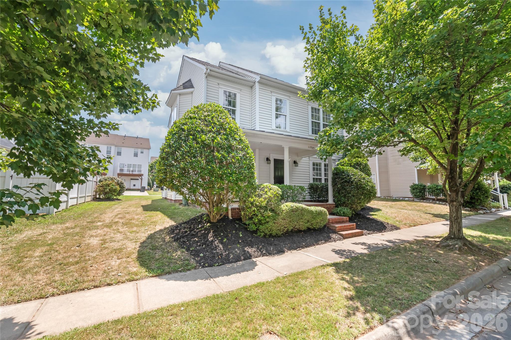 Welcome home to the highly sought-after Kingsley community in the heart of Ballantyne! Perfectly situated on a desirable lot with a two-car garage, this beautifully maintained home offers the ideal combination of location, comfort, and flexible living space. Just steps from the community pool, playground, pocket park, and green space, you'll enjoy one of the neighborhood's most convenient locations.

Move-in ready and thoughtfully updated, the home features fresh interior paint, updated flooring, and a beautifully renovated kitchen with 42-inch cabinetry, quartz countertops, stainless steel appliances, recessed lighting, and a sunny breakfast area. Whether hosting holidays in the formal dining room or enjoying casual meals with family, this home offers spaces designed for both entertaining and everyday living.

The inviting living room is filled with natural light and centers around a warm gas fireplace, while a dedicated main-level office provides the perfect work-from-home space or flex room.

Upstairs, the spacious primary suite serves as a private retreat, featuring two walk-in closets and an ensuite bath with a soaking tub, walk-in shower, and generous storage. Two additional bedrooms share a well-appointed hall bath, while the expansive bonus room above the garage is complete with its own private staircase and full bath, offering incredible flexibility as a fourth bedroom, media room, playroom, or guest suite.

Step outside to enjoy the private patio, ideal for grilling, entertaining, or relaxing after a long day.

Located just minutes from Ballantyne's premier shopping, dining, grocery stores, The Bowl at Ballantyne™, I-485, and award-winning schools, this exceptional home delivers the walkable lifestyle today's buyers are looking for. Combining thoughtful updates, an outstanding floor plan, and an unbeatable location, this Kingsley gem is one you won't want to miss.