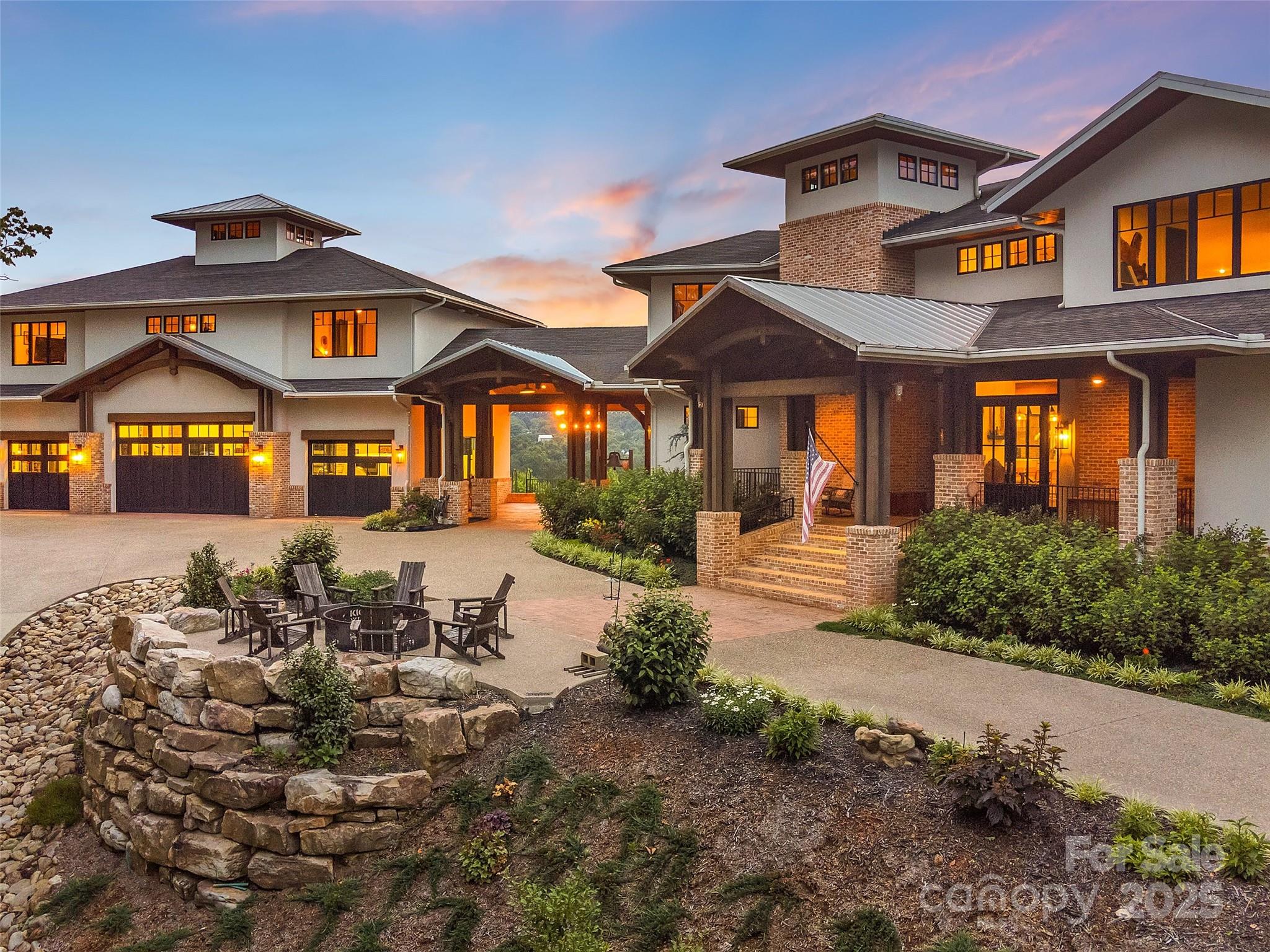 Absolutely spectacular custom mountain estate showcasing magnificent long-range views toward the Blue Ridge Parkway. Nestled on 36.79± private acres in Mills River near South Asheville, this exceptional property offers the perfect balance of seclusion and convenience—just minutes to Asheville, Hendersonville, Brevard, and approximately 10 minutes to Asheville Regional Airport.

Designed for both grand entertaining and comfortable everyday living, the home features expansive open living areas, rich hardwood floors, and a gourmet kitchen outfitted with top-of-the-line appliances. Three fireplaces add warmth and ambiance throughout, while the spacious primary suite provides a private retreat.

Outdoor living is equally impressive, highlighted by a stunning covered porch with a fireplace—perfect for enjoying breathtaking mountain views year-round. The estate also includes a four-car garage with guest quarters above, offering flexibility for visitors or extended stays.

The land itself is truly remarkable, featuring a mix of pasture and open space ideal for gardening or recreation, a paved driveway with gated entrance, and extensive frontage along Boylston Creek. Private trails wind through the property, inviting exploration and connection with nature.

A rare offering in the heart of Western North Carolina, this extraordinary estate captures the very best of mountain living—privacy, beauty, and unmatched proximity to the region’s most desirable destinations.