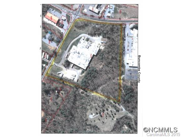 Excellent location in South Asheville! 15.23 acre site with 80,686 sf building.  Approximately 3,000 sf of office space.  Cross Docks with Docks on both sides of the building.  Would make a good Multi-family site as well.  Probably would need to be re-zoned. Would consider subdividing the property.  Building can also be available for Lease. Corner of Mills Gap and Sweeten Creek Road.  Old Spotless Manufacturing.