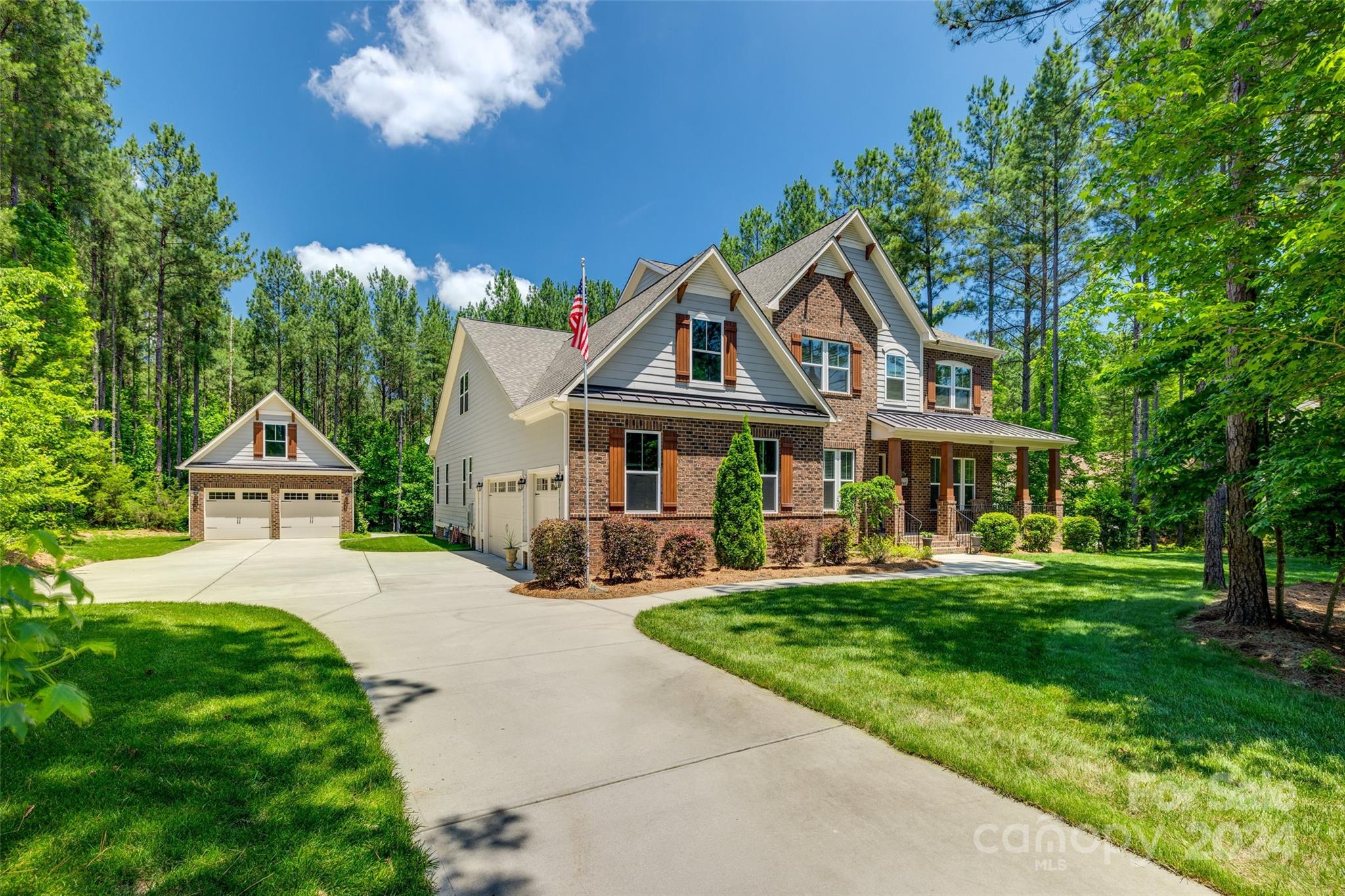 Welcome to your dream home! This stunning 4-bedroom, 4-bathroom residence offers an exquisite blend of comfort and luxury. Nestled on a private lot with mature trees, this home is situated in the highly sought after Catawba Shores Estates and just a short distance to walking trails along the Catawba River. The spacious interior features a formal dining room perfect for entertaining, a dedicated office for remote work, an oversized bonus room, and a an exercise room which can also be used as a 5th bedroom. You'll find plenty of extra storage throughout the home, including a climate controlled attic  for all of your storage needs. The screened back porch provides a serene retreat for relaxation, while the additional detached garage offers even more storage and workspace. Enjoy the perfect blend of tranquility and convenience in this beautiful home. Don't miss the opportunity to make this your forever home!