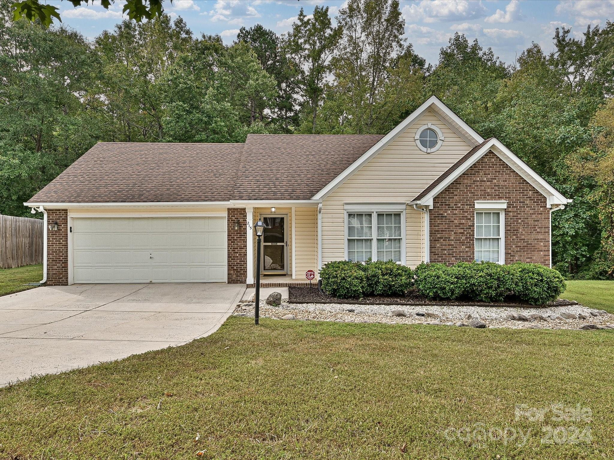 Wonderful opportunity to own in the quiet community of The Woods of Coulwood.  This community is a short commute to Uptown Charlotte or the airport.  This ranch home offers luxury vinyl hardwood floors in the living room, kitchen, breakfast area, and hallway.  The kitchen has white cabinets, white appliances, laminate countertops, and a bay window.  The spacious great room offers a vaulted ceiling and fireplace.  Blinds are installed on the windows.  All bedrooms offer carpet with ceiling fans.  The primary bedroom has a vaulted ceiling and a walk-in closet.  New architectural roof installed in 2018.  A new HVAC was installed in 2016.  Shed conveys with home. New fenced-in yard in 2023. New deck in 2024.