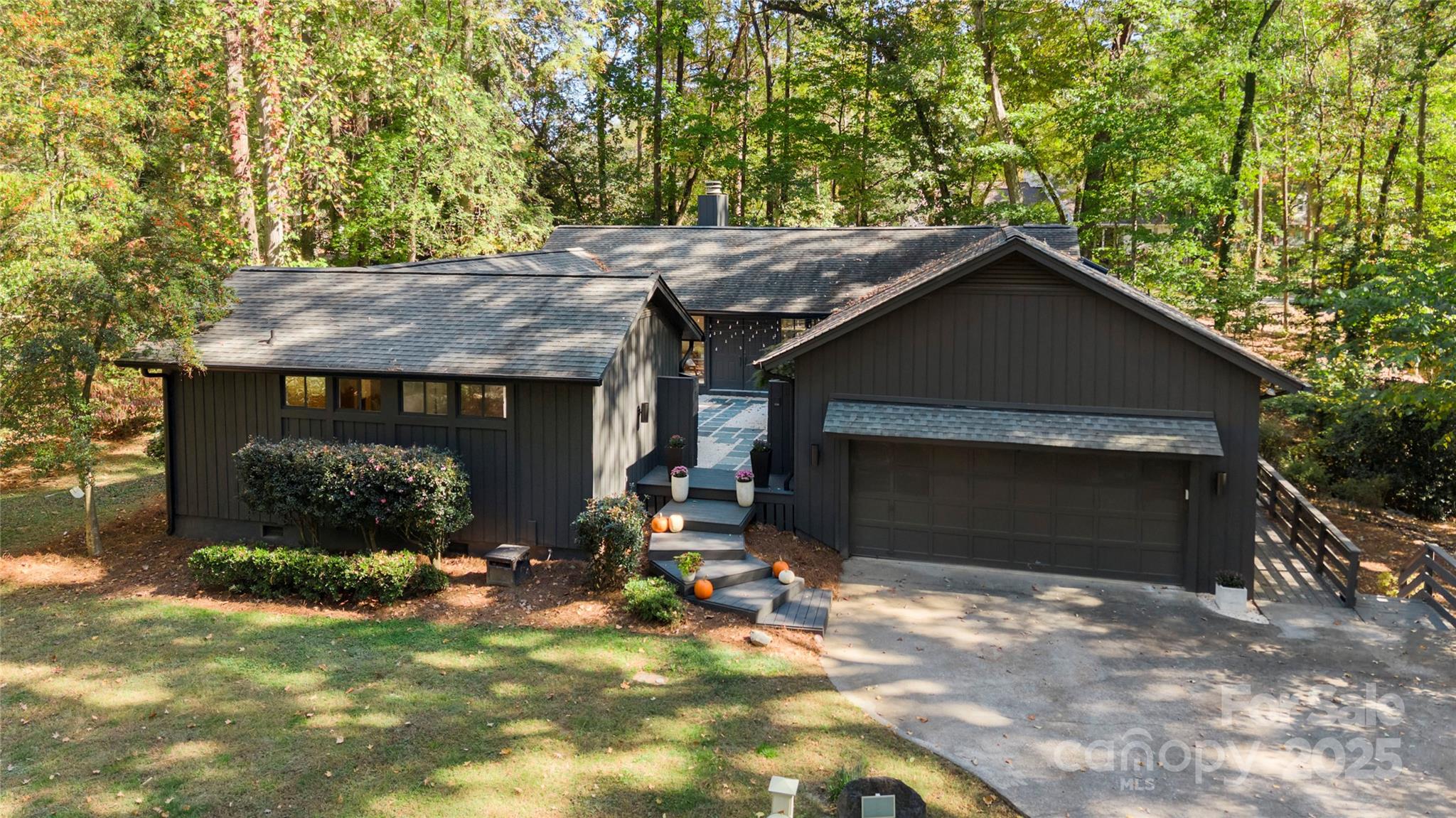 Welcome home to this beautifully updated 4-bedroom, 3.5-bath home with a 2-car garage in the desirable River Hills community. Enter through the peaceful, zen-inspired private courtyard into a light-filled living room featuring vaulted ceilings, a wall of windows, and a cozy wood-burning fireplace. The open-concept layout flows seamlessly into the kitchen, perfect for entertaining with a large island, breakfast nook, KitchenAid appliances, quartzite countertops, walk-in pantry/mudroom, and a convenient wet bar. Step from the kitchen or living area onto the screened porch and back deck to enjoy the surrounding nature and fenced backyard (.53 acre lot). The main level includes the primary suite with ensuite bath, laundry, and two additional bedrooms with a shared Jack-and-Jill bathroom. The finished walk-out basement offers abundant natural light, a full bath, bedroom, and second living area ideal for guests, an office, or playroom. The walk in crawl space offers a workshop area w/ electrical & lighting. 11 new windows are scheduled to be installed soon on the main level. River Hills offers resort-style amenities, including 24/7 guarded gate access, a neighborhood beach park, optional country club membership, playground, dog park, walking trails, and marina access. Agent is owner. 3D Zillow Tour Available.