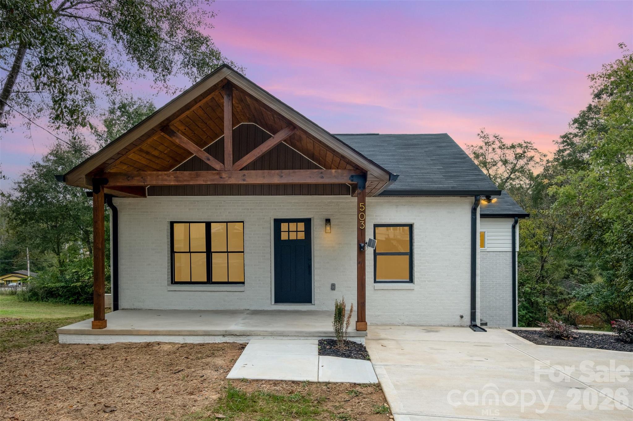 PRICE REDUCTION! Fall in love with this stunning, fully renovated white brick ranch at 503 East Circle Drive. From the designer-inspired open layout to the crisp, brand-new flooring and fresh paint, every inch of this 3-bedroom, 2-bath home feels like a breath of fresh air. The kitchen offers sleek countertops and new stainless appliances, while the finished basement offers that extra living space. Enjoy the spacious back yard and porch, just in time for summer living. Nestled on a spacious lot just minutes from the heart of downtown Shelby, this move-in-ready gem isn't just beautiful, it’s affordable. Qualifies for 100% USDA Financing (0% Down!) Don't just dream of homeownership, walk into it today!