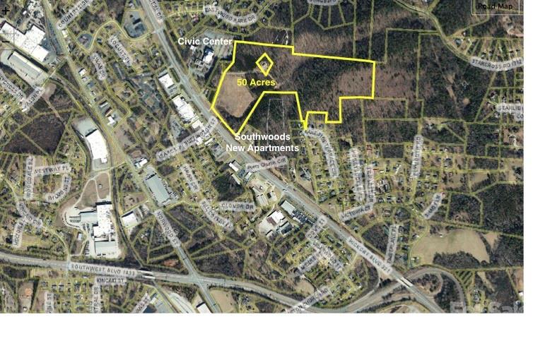PRIME COMMERCIAL DEVELOPMENT OPPORTUNITY. 50+ Acres EXCEPTIONAL HIGHWAY FRONTAGE  Gateway position to the Blue Ridge Mountains and popular resorts. Premium commercial or multi-family residential site captures daily traffic flow of 25,000+ vehicles.  LOCATION ADVANTAGES 640 +/- feet frontage on U S Highway 321 (4-lane divided hwy), Located in Lenoir - Caldwell County seat (population 18,000), 2.5 miles south of US 321 US 18 intersection. Adjacent to J.E. Broyhill Civic Center and new multi-family development.  DEVELOPMENT READY Zoned: B7 Highway Business/Commercial, Utilities: Water, sewer, natural gas, and electric to site.  Approx 12 acres graded and ready for development facing US 321 (Hickory Blvd).  Phase I study available upon request.  Can subdivide.