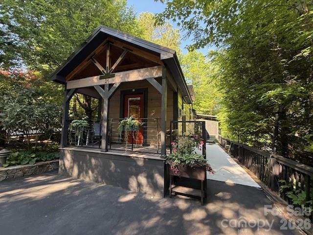 Welcome to this 2023 park model home located in the highly sought-after Westridge neighborhood. This fully furnished(few exceptions) retreat offers a perfect blend of comfort, style, and functionality making it an ideal short-term rental investment or a luxurious personal getaway. Vaulted ceilings that carry seamlessly from the living area onto the charming front porch, creating an open and airy ambiance. Spacious loft bedroom, a modern full bath, and a bright living room centered around a cozy gas fireplace.The kitchen is a chef’s dream, featuring sleek stainless steel appliances, ample counter space, and custom built-in storage throughout the home, offering both convenience and elegance. Out back,enjoy a generous private deck, perfect for entertaining or relaxing while taking in the serene surroundings. Below,a versatile guest bedroom/full bath & garage provide extra space for visitors, storage, or even a private retreat. Call today for a showing!