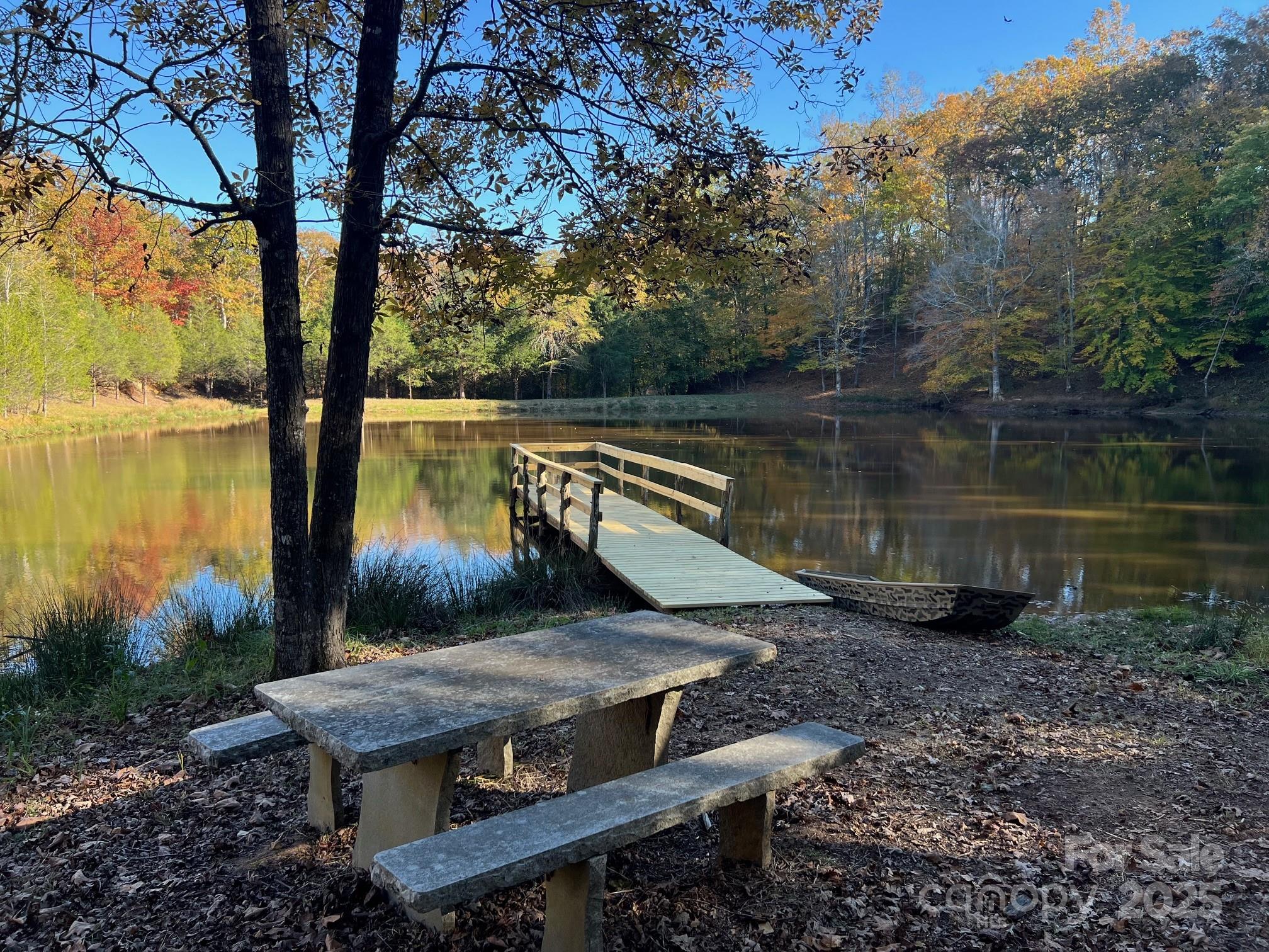 Your own private park! Zoned for farm use, low taxes! A true slice of heaven, homestead & sportsman’s paradise w/ deer, turkey, rabbit & fishing less than 1-hr SW of Charlotte! 195.51 acres, various terrain, appx 70% hardwood & 30% pine, appx 4 acres of open yard & fields. 1.5 acre pond w/ new pier (Oct 2025), concrete picnic table, dam & spillway, and stocked with largemouth bass & bluegill. Appx 2.7 miles of hiking & ATV trails. Appx 5,185 ft (0.98 mi) of creeks with 3 new bridges (July 2025). Appx 1,090' paved road frontage on Hwy 49. Includes a charming 1BR/1BA cabin w/ kitchen, walk-around chimney w/ open fireplace & wood stove on opposite sides, covered open front porch & screened side porch. Brand new well system & new well house installed May 2025 & septic tank. Duke Power utility. 30A power hookup for camper. 2-story pole barn w/ water supply & open, double-bay tractor shed. Cinderblock storage bldg w/ water & wired for power.