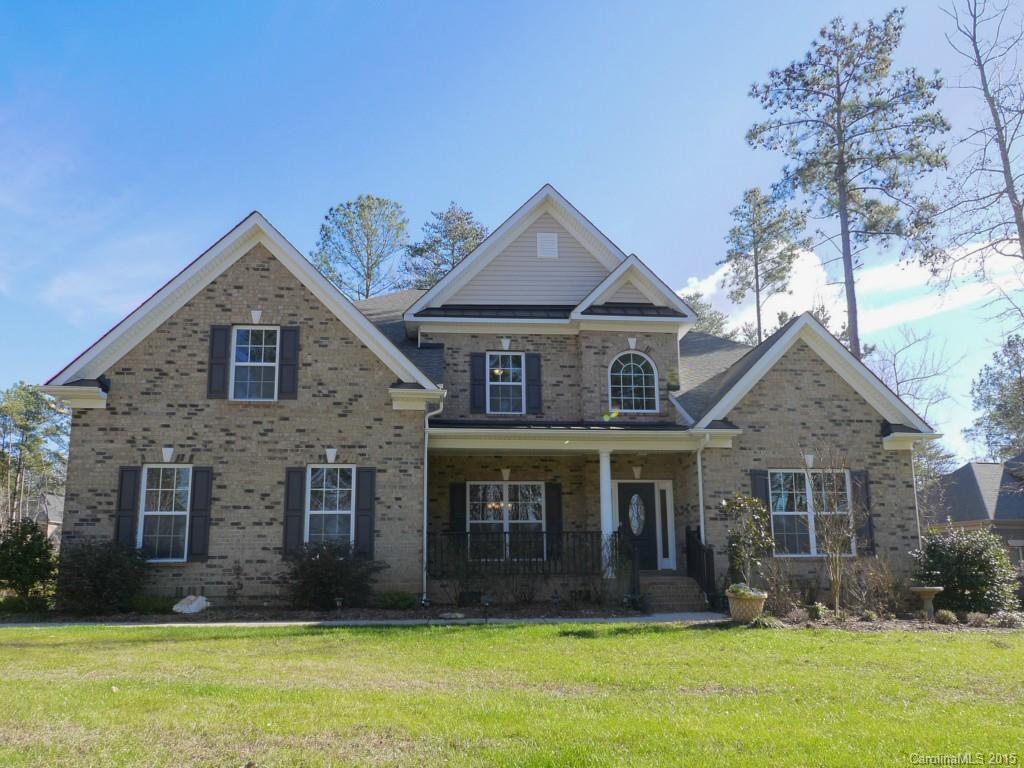 Under $400,000 in Handsmill on Lake Wylie! All brick home on fenced corner lot in gated waterfront community with clubhouse, pool, fitness center, lake access, walking trails. Future Marinas and boat launch. Top rated Clover Schools. Home has master on main; 3 large bedrooms upstairs, bonus room and media room upstairs. Stainless steel appliances, granite counters and Butler Pantry in Kitchen. Classic architectural detail throughout home-coffered and trey ceilings, heavy moulding and trim.