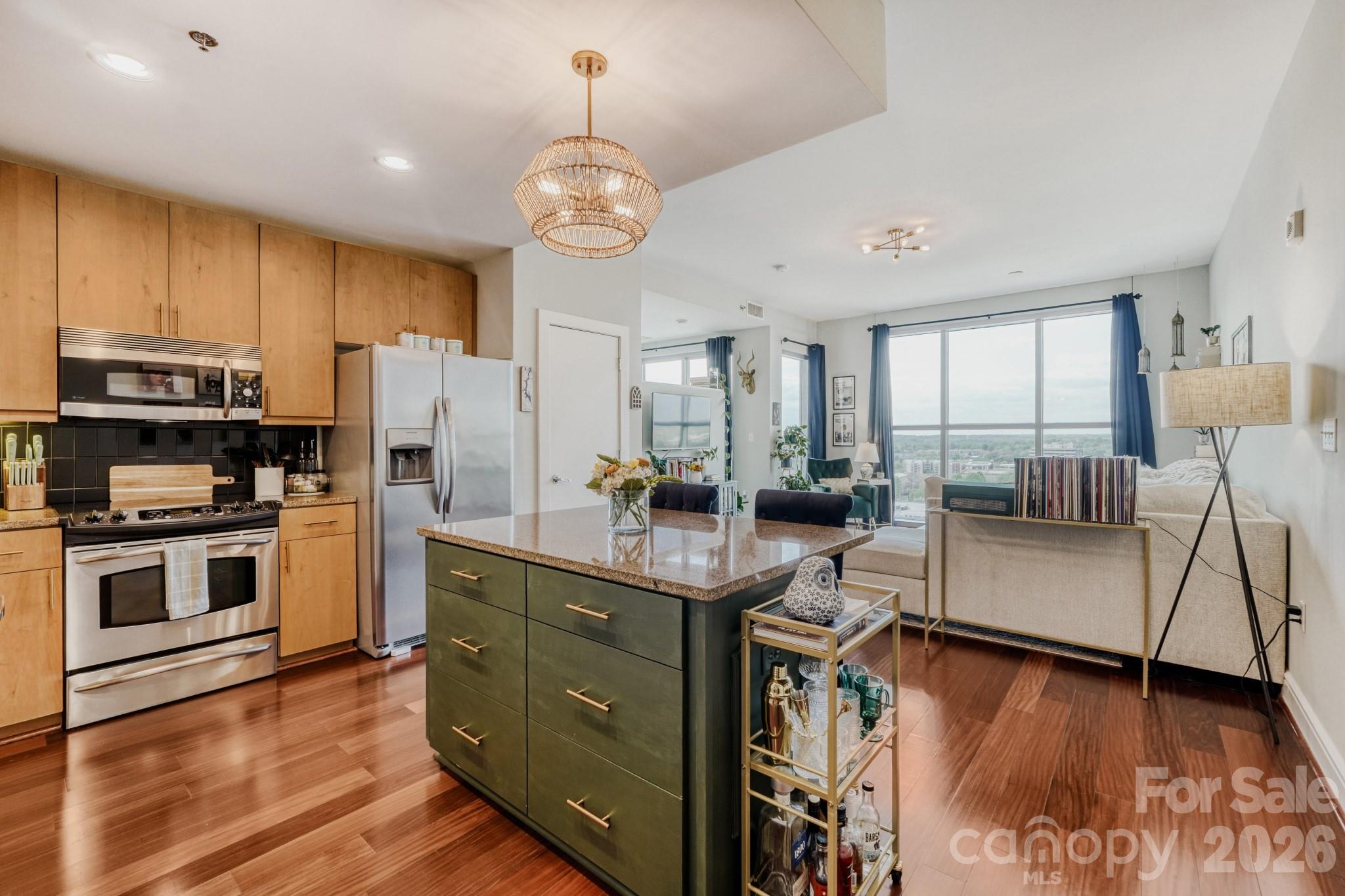 Experience elevated Uptown Charlotte living in this beautifully appointed residence at 333 West Trade Street, Unit 1105. This spacious one-bedroom floor plan is filled with natural light thanks to dramatic floor-to-ceiling windows that frame stunning city views and capture Charlotte’s unforgettable golden hour sunsets over the stadium.
Step inside to discover beautiful finishes throughout, including new floors and fresh paint, creating a polished and modern living space that feels both stylish and inviting. The open layout flows seamlessly from the living area to a large private balcony, perfect for morning coffee, evening relaxation, or entertaining while enjoying vibrant skyline views.
The generously sized one-bedroom layout offers comfortable living with ample space, making it ideal for a full-time residence, city pied-à-terre, or investment opportunity in one of Uptown’s most desirable high-rise locations.
Located in the heart of Uptown Charlotte, you’ll enjoy immediate access to the city’s best dining, entertainment, sports venues, and business district—all just moments from your door.
