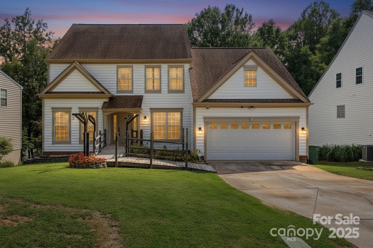Welcome to this charming 4-bedroom, 2.5-bath home close to the best of Fort Mill. With its traditional floorplan, this home offers the perfect blend of comfort and functionality. Step inside to find a welcoming living room and dining room, ideal for gatherings both big and small. The spacious great room with its cozy atmosphere is perfect for everyday living, while the main-level primary suite provides convenience and privacy.  Upstairs, you’ll find three additional bedrooms, one that can easily flex as a bonus room The unfinished basement is already wired for a workshop, giving hobbyists or DIY enthusiasts a head start—and it’s full of untapped equity potential if fully finished, waiting for your vision to bring it to life.  With its thoughtful layout and inviting spaces, 105 Lyman Oak is ready to be filled with new memories. A true Fort Mill gem, it combines practicality, potential, and warmth all under one roof.