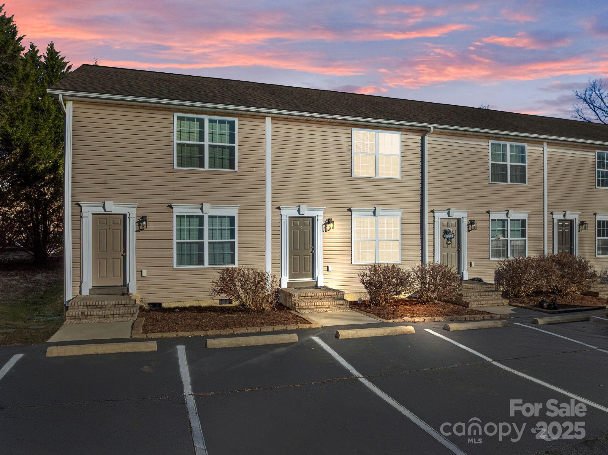 First-Time Buyer Financing Opportunity:
Potential 0% Down Financing
No PMI Options Available
Up to $10,000 in Grant Funds for Qualified Buyers

Nestled in a private, quiet townhome community surrounded by stunning mountain views, this recently renovated two-story, 2-bedroom, 1.5-bathroom townhome offers a rare balance of peaceful surroundings and everyday convenience. The interior has been thoughtfully updated with new flooring throughout, fresh paint, modern fixtures and lighting, and a fully renovated kitchen featuring new cabinets, countertops, and appliances, including an electric range/oven, dishwasher, microwave, and refrigerator.

The well-designed layout provides comfortable main-level living with bedrooms upstairs, complemented by a front entry porch and a covered rear deck ideal for enjoying the outdoor setting. The community has also benefited from recent exterior building enhancements and parking upgrades, adding curb appeal and long-term value. Located just two miles from the new Meadow View development, the surrounding area continues to show strong growth while preserving its quiet, tucked-away feel. HOA-maintained exterior and common areas offer low-maintenance ownership in a desirable Fletcher location with convenient access to Asheville and Hendersonville.