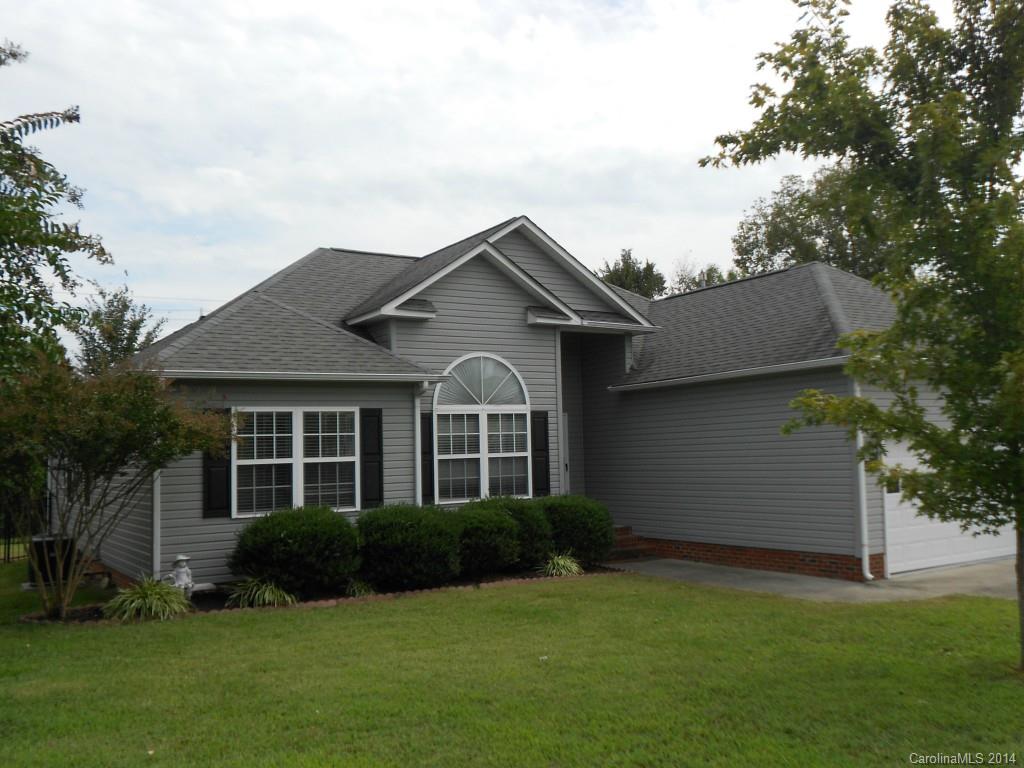 Charming Ranch home with open floor plan and spotless interior.  Vaulted Great Room with fireplace, Dining Area, Eat-in Kitchen open to covered porch.  Large Master Bedroom with Trey ceiling, Master Bath with double sinks and garden tub, separate shower.  New Carpet in Bedrooms and Laminate in Great Room.  Large Fenced Yard.  Oversized two car garage.