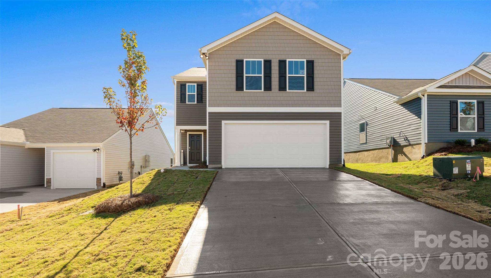 Introducing Providence Walk, a new home community located in Hendersonville, NC and minutes from main street in downtown with charming restaurants, quaint boutiques, parks and the Equsta Trail. As you step off the front porch and into the foyer, you will notice the openness of this floor plan that creates an inviting space within the kitchen and family room. A half bath is conveniently steps away from the main living area, as well as additional closets for extra storage. The kitchen is complete with beautiful countertops, ss appliances and island. Upstairs, you will find 4 bedrooms, including the primary suite with bathroom and extra loft area. The laundry is also conveniently upstairs with the bedrooms. *Home features are subject to change without notice. Internet service not included. Sq footages are approximate*