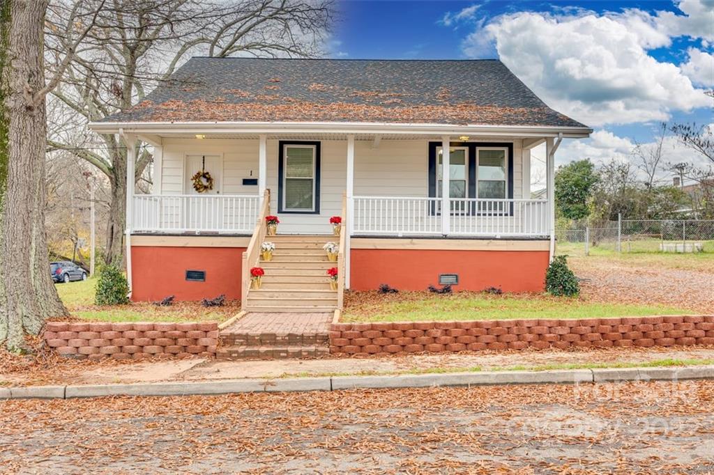 This 3 Bedroom, 2 bath, single story home has been almost entirely renovated and is ready for a new owner! The home has 10' ceilings, crown moulding and new flooring throughout; the bathrooms both have new ceramic tile and quartz vanities. The new kitchen has 42” cabinets, granite countertops, a large island with seating, polished ceramic flooring, and new appliances. All new windows provide natural light that shines through the rooms! The front porch is 112 square feet and a great place to enjoy your morning coffee. The backyard is large and fenced in with a white privacy fence. Use your creative skills to create the perfect outdoor space! The home sits between Dave Lyle Boulevard’s abundant shopping and Rock Hill’s quaint downtown.